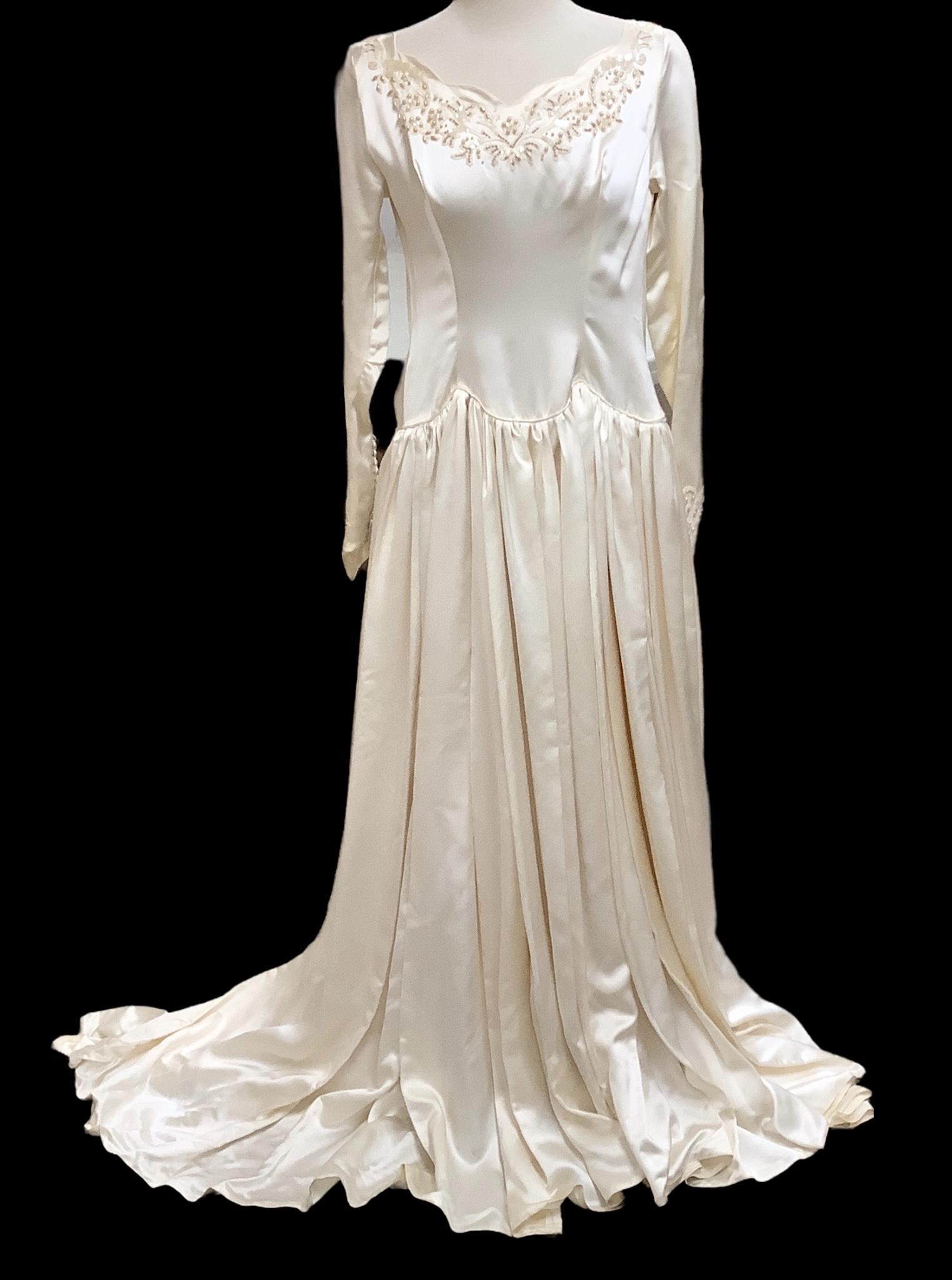 Vintage long sleeved full length wedding dress, size medium/large, beading on front, back and on (1 of 2)