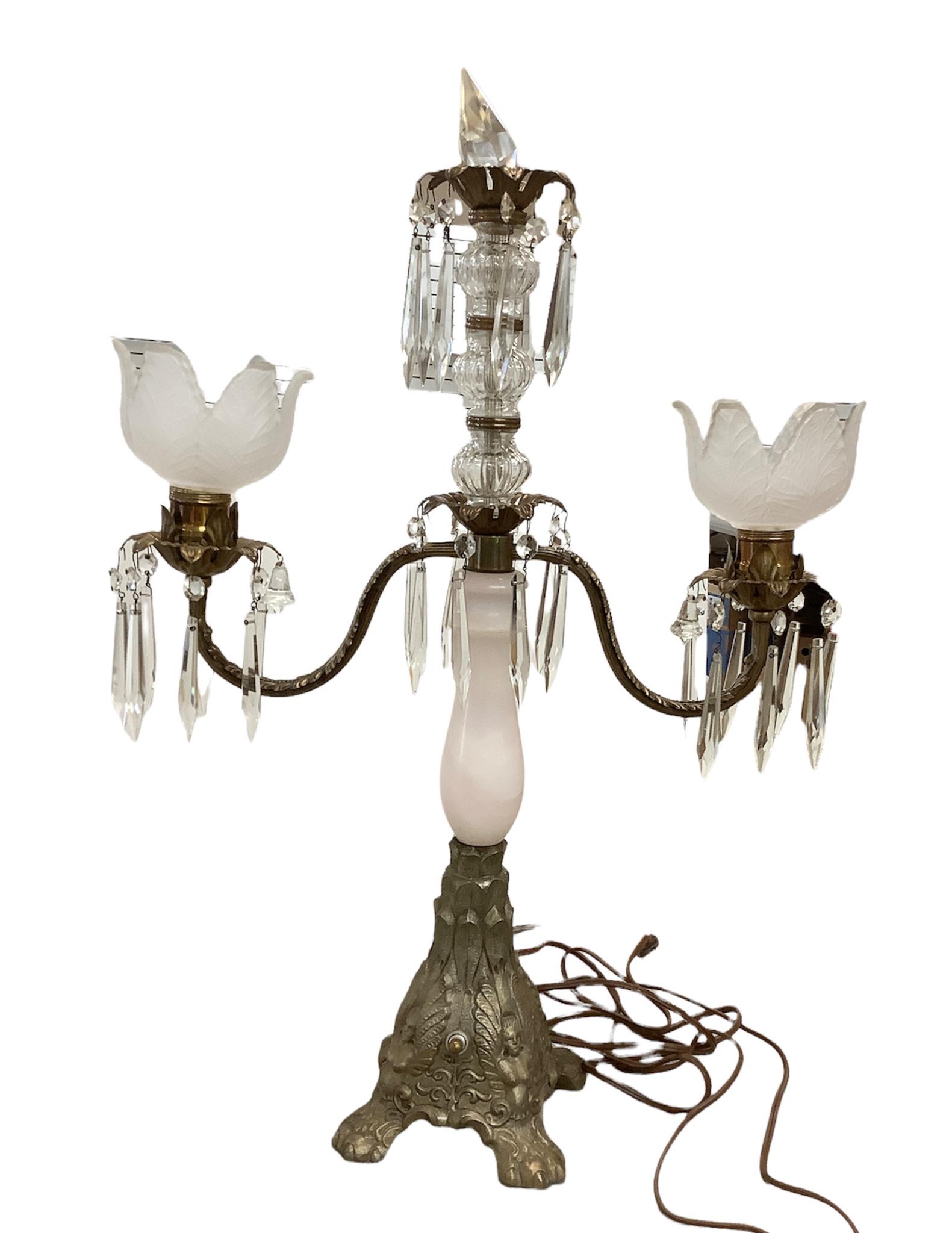 Candelabra electric lamp. 24 inches tall. Figural cast base with pale pink marble stem. Complete