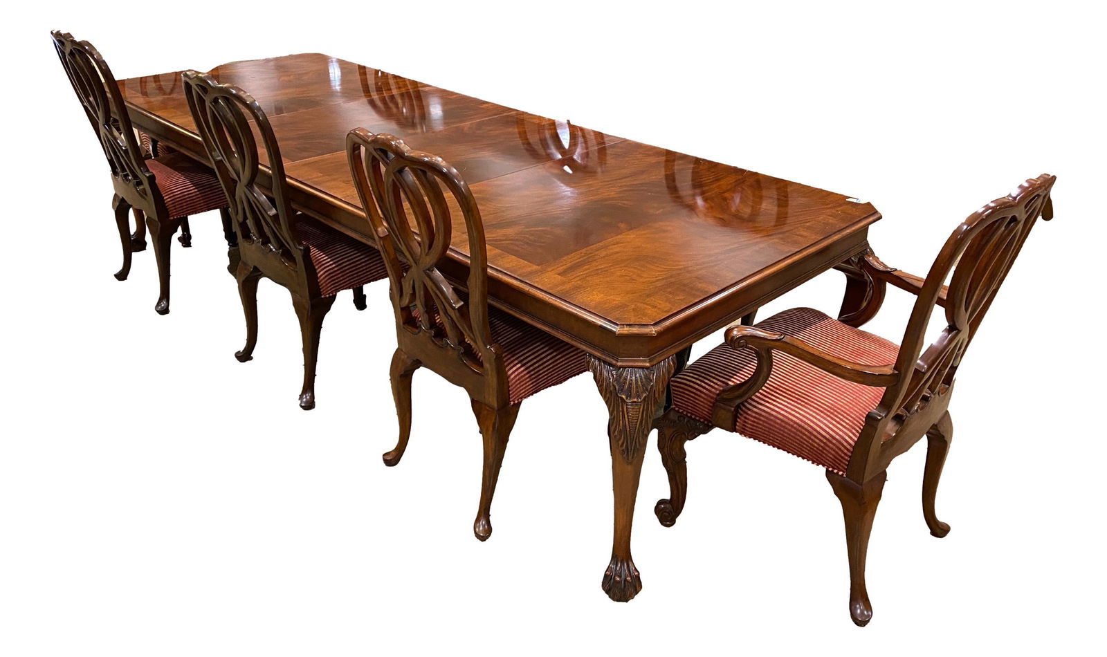 Chippendale style, Mahogany Henredon dining room table and 8 chairs, 122" (with leaves) comes with: Chippendale style, Mahogany Henredon dining room table and 8 chairs, 122" (with leaves) comes with (2) 22" leaves.