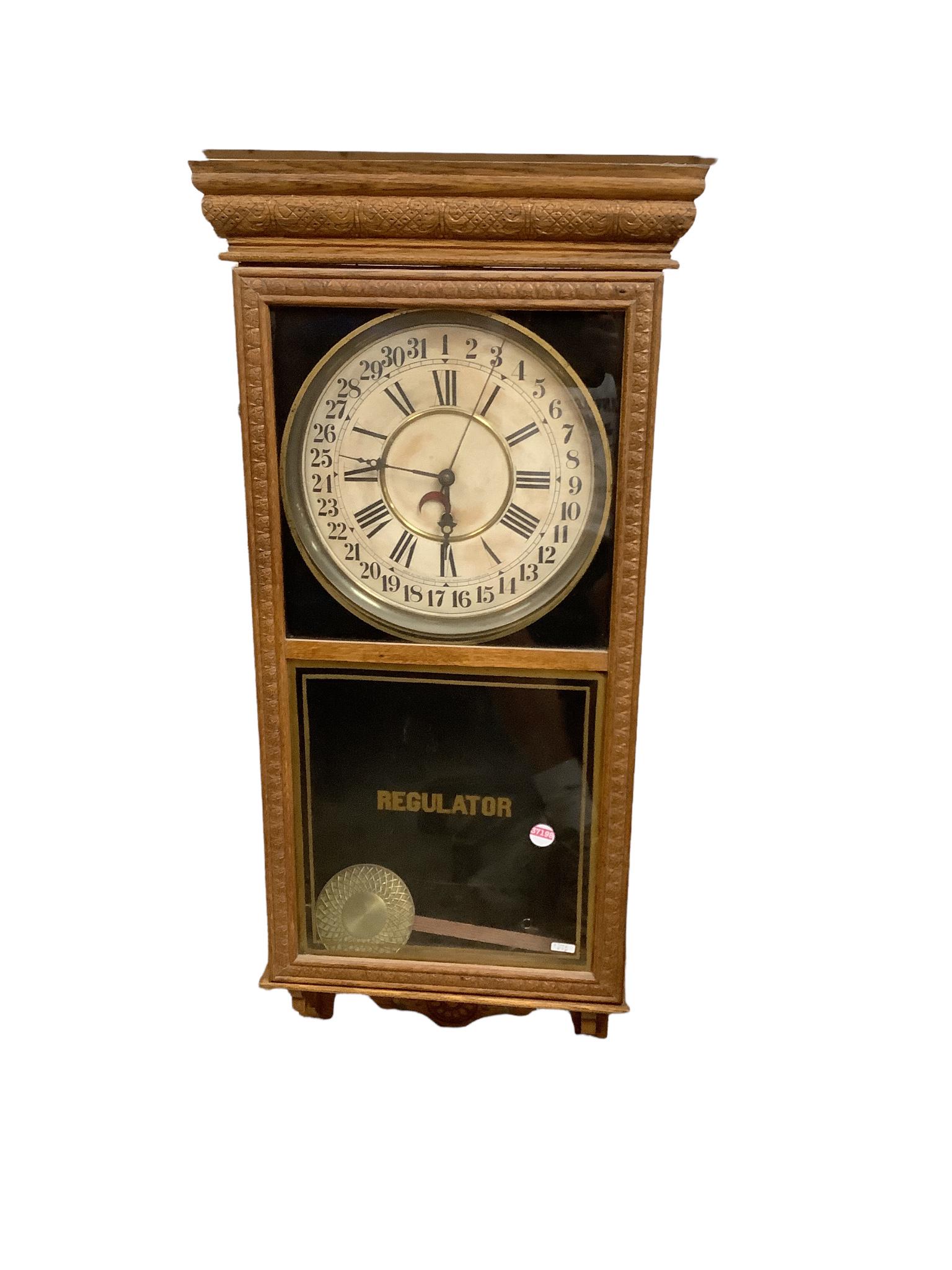 Oak Sessions regulator clock with calendar dial. 40" tall. (1 of 1)