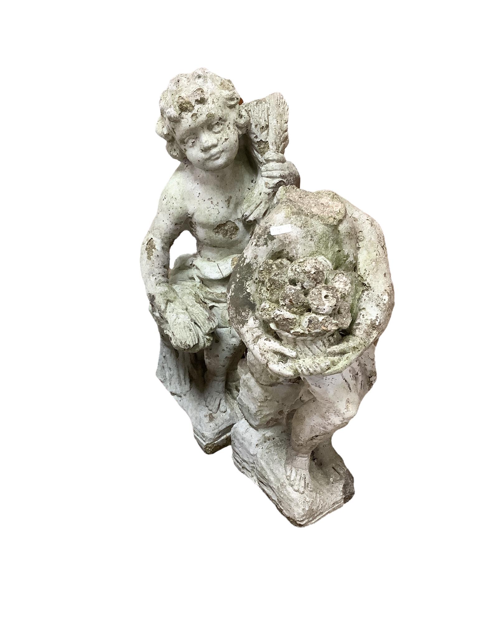 Two concrete garden statues, one is missing head. (1 of 1)