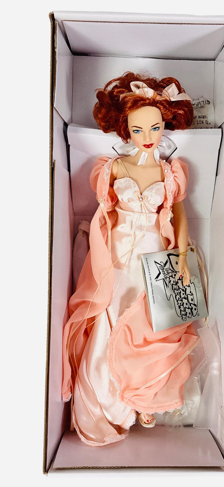 Effanbee Dale Messick 15" Brenda Starr Reporter, "Brenda" doll in a peach lingerie assemble wrist: Effanbee Dale Messick 15" Brenda Starr Reporter, "Brenda" doll in a peach lingerie assemble wrist tag, NIB, COA.