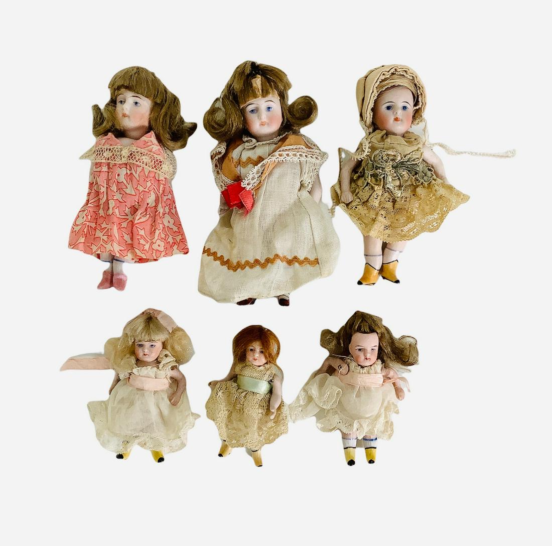 Tramp Art box with six All Bisque Dolls. 3" to 5" dolls with mohair wigs, painted facial features, (1 of 4)