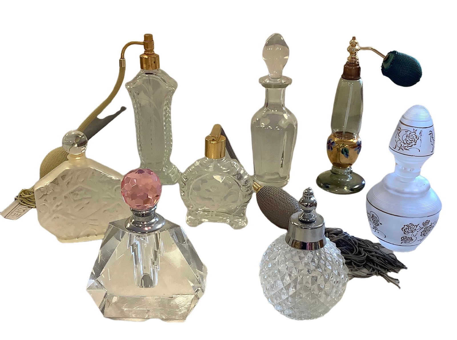 Lot of 8 glass perfume bottles. Three with atomizers and 5 with stoppers. Six are clear, one frosted (1 of 1)