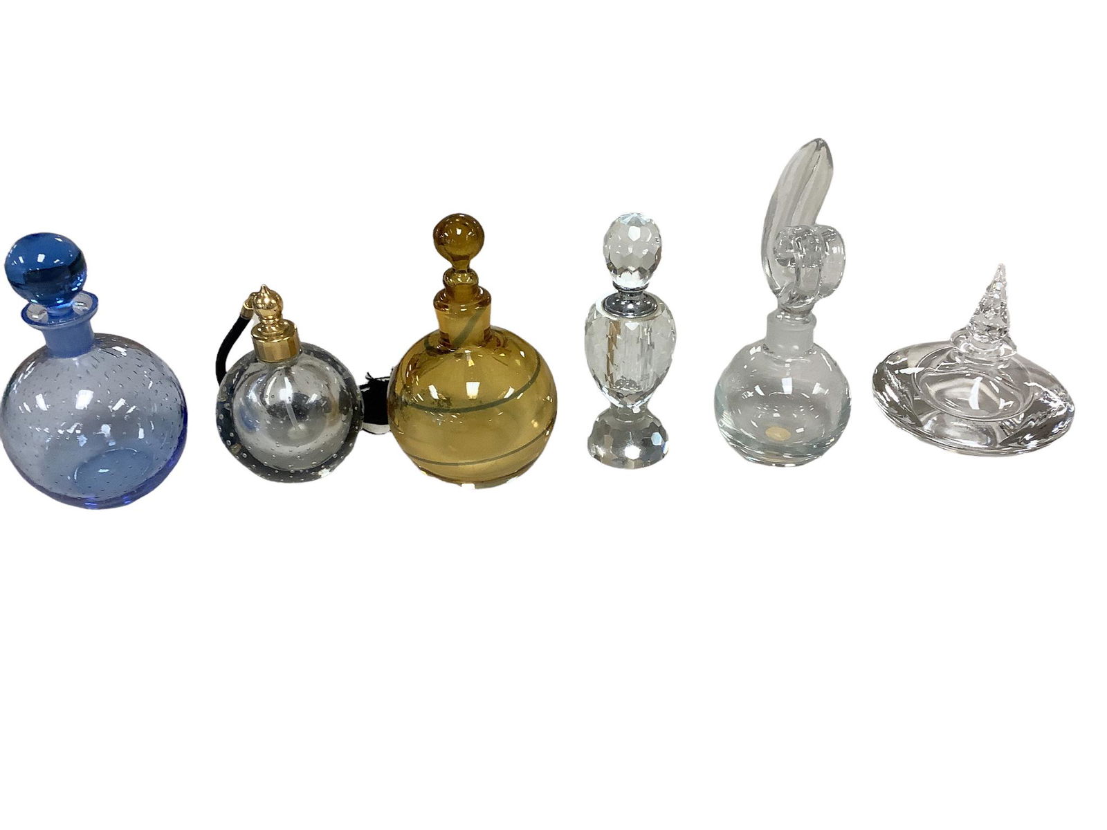 Lot of 6 perfume bottles with stoppers, ranging in height from 4.25 - 6.75". (1 of 1)