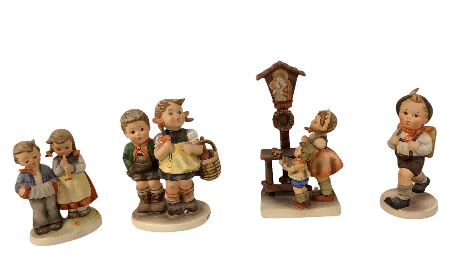 4 Hummel figurines ranging from 4" to 6 " high: 4 Hummel figurines ranging from 4" to 6 " high