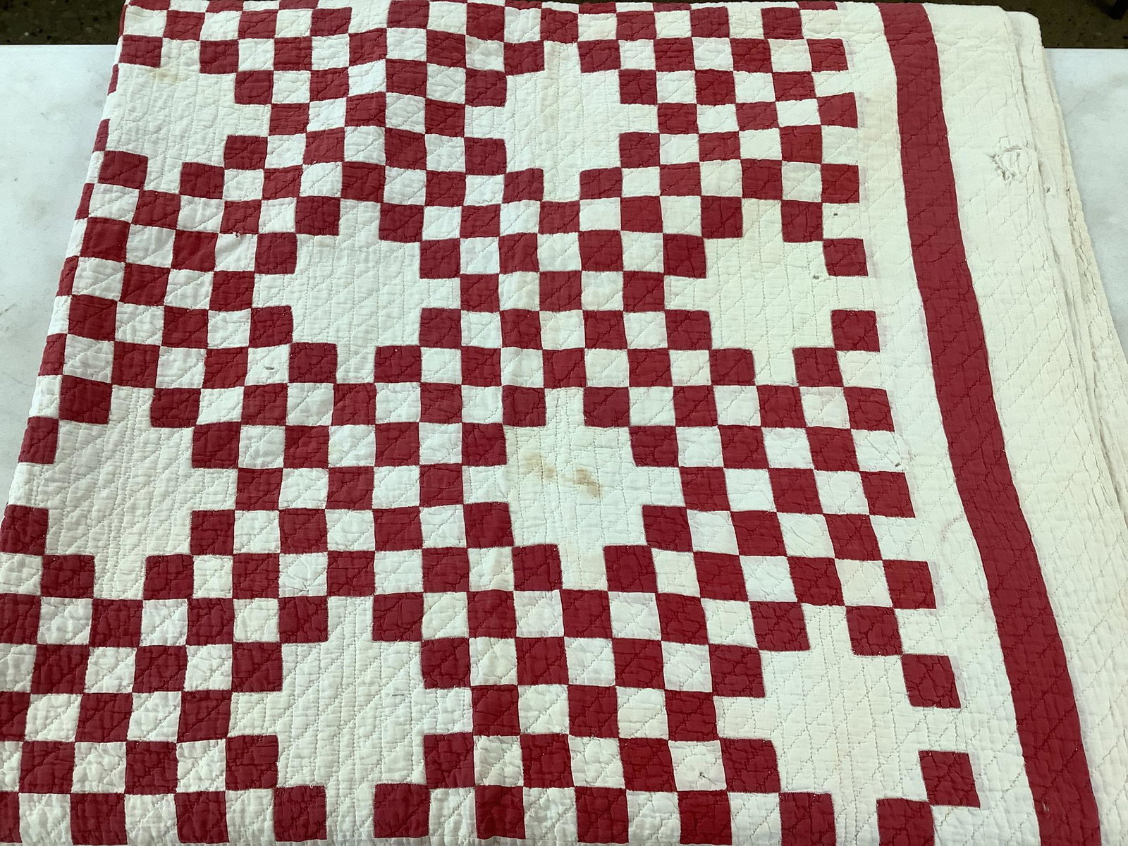 71"x72" checkered quilt. Does have sm. holes & few stains: 71"x72" checkered quilt. Does have sm. holes & few stains
