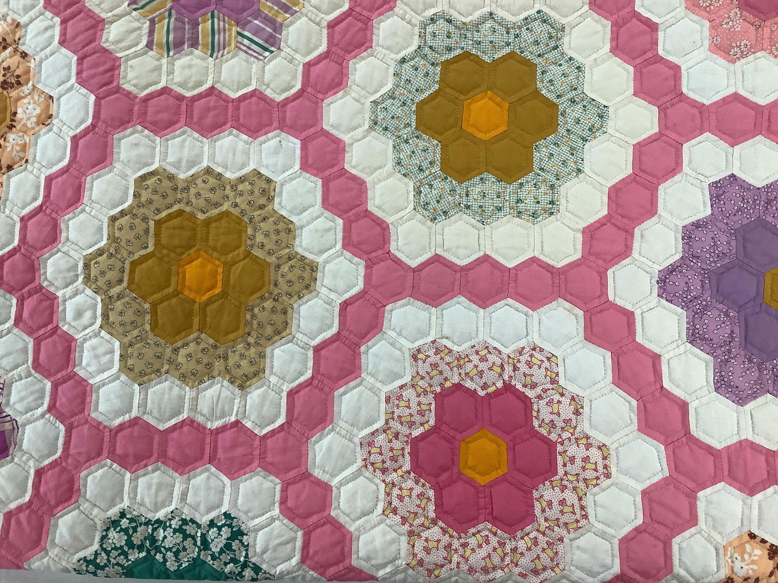 Grandmother's flower garden quilt 86"x99". Made in 1930's and sewn into quilt in 1992. Quilted by (1 of 4)