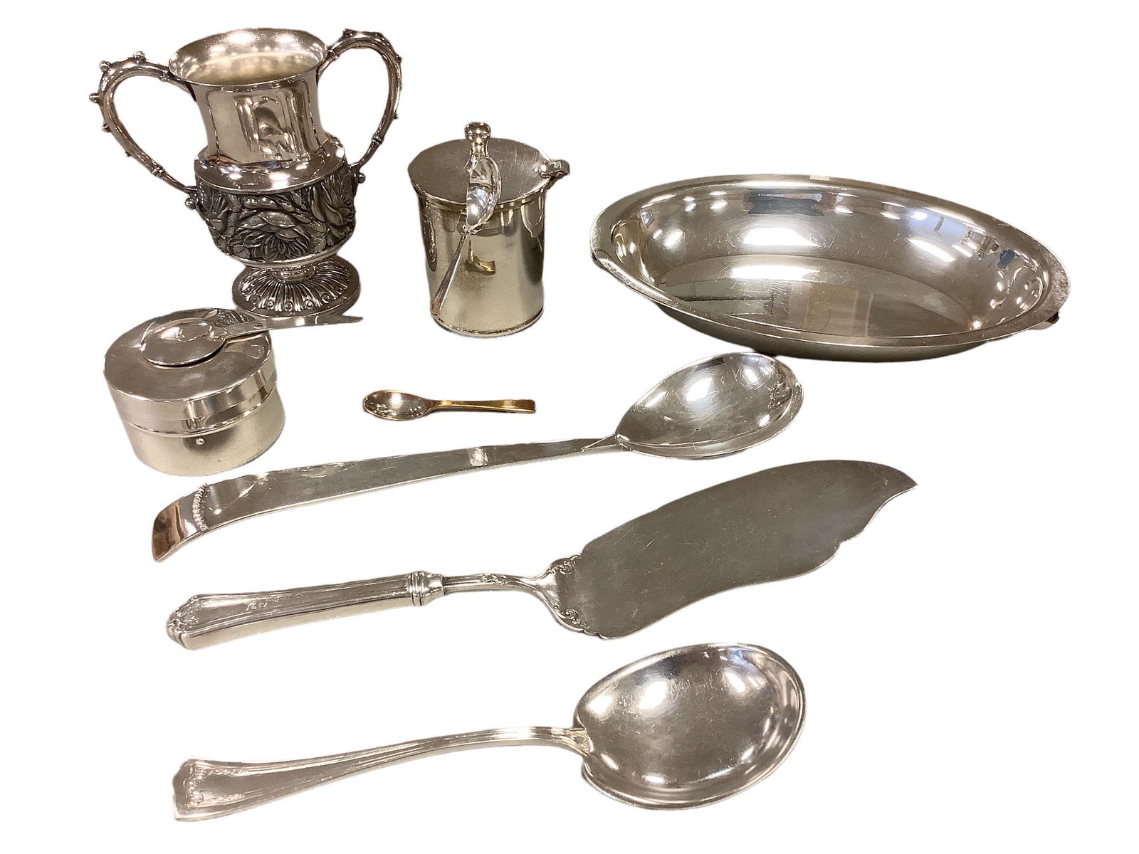 Lot of silverplate including a 6” tall Meriden quadruple-plate handled vase, misc. serving (1 of 1)