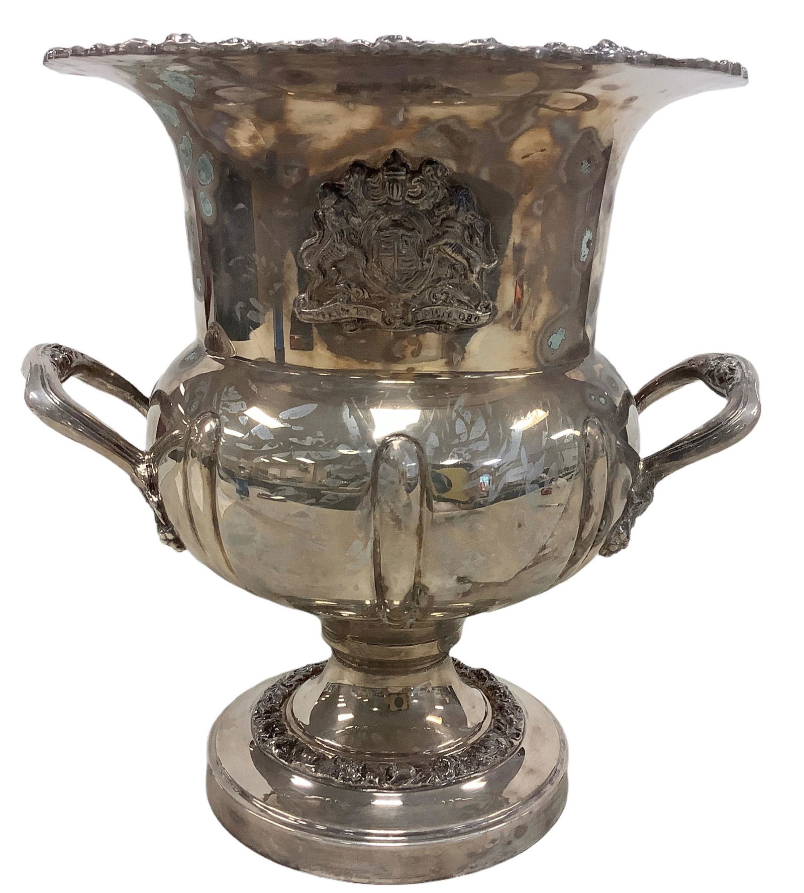 Silver plated bucket w/coat of arms @ 10 1/2” tall. Marked on bottom, “Silver on: Silver plated bucket w/coat of arms @ 10 1/2” tall. Marked on bottom, “Silver on Copper.” Some mottling of finish.