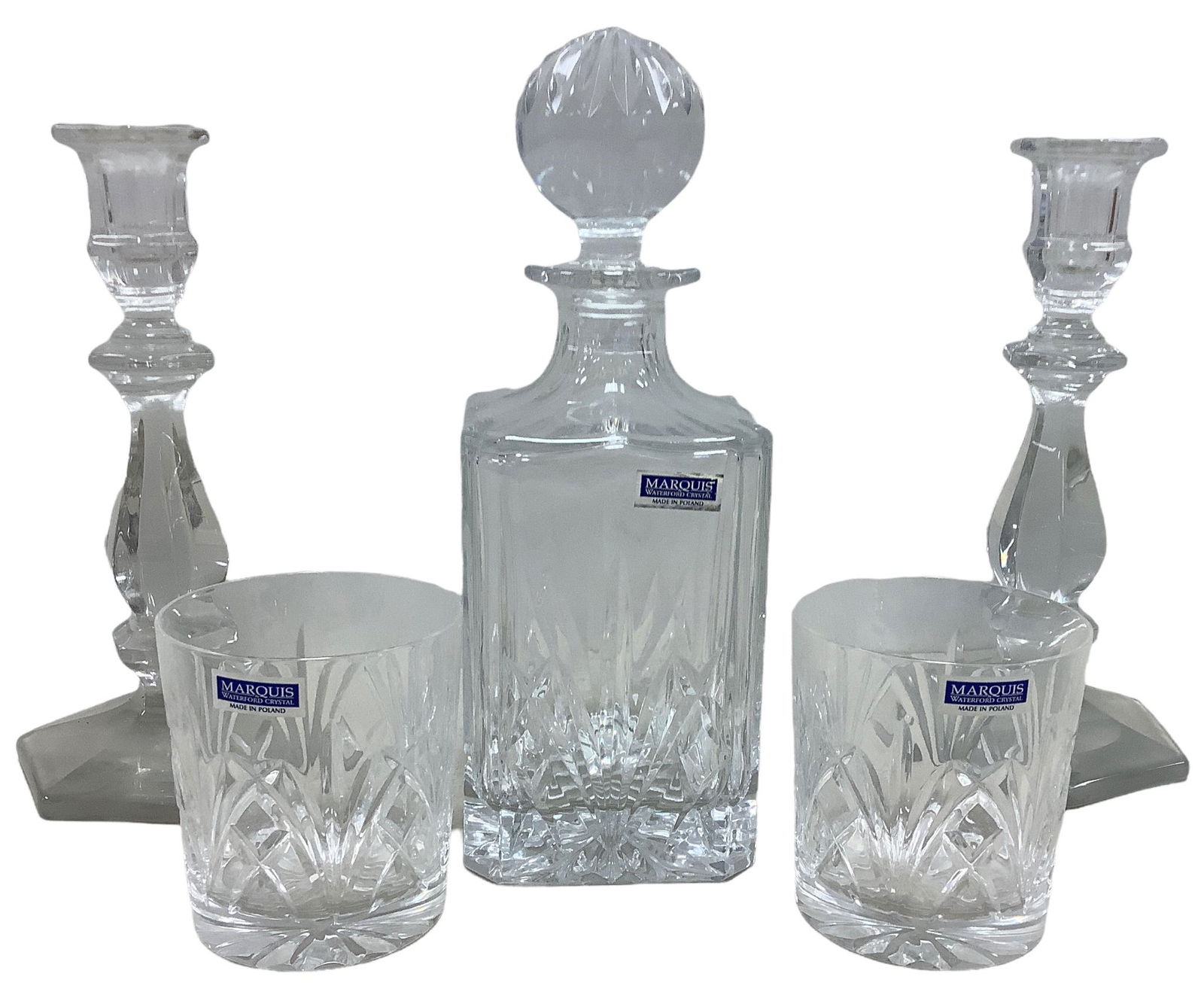 Lot includes a Marquis by Waterford, made in Poland, crystal decanter @ 10” tall w/2 matching (1 of 1)