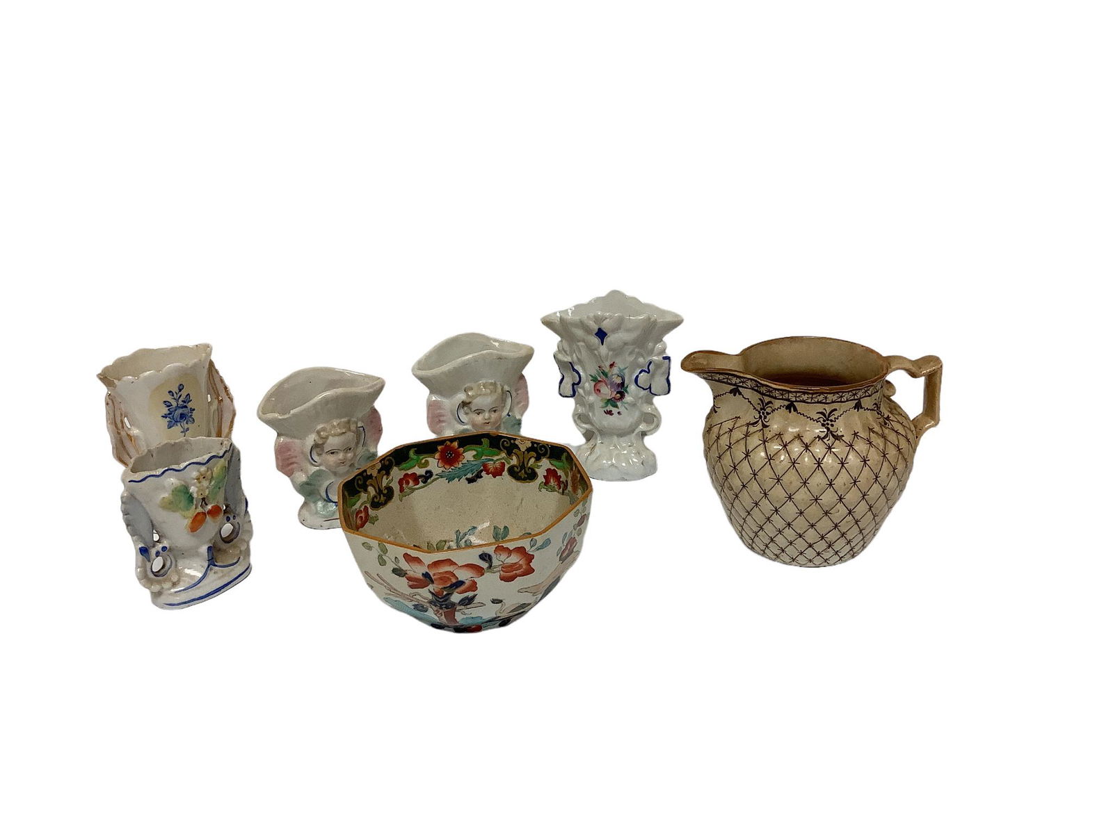 Lot of a variety of items five pieces of porcelain vases one with a chip. Ranging from 3.5” to (1 of 1)