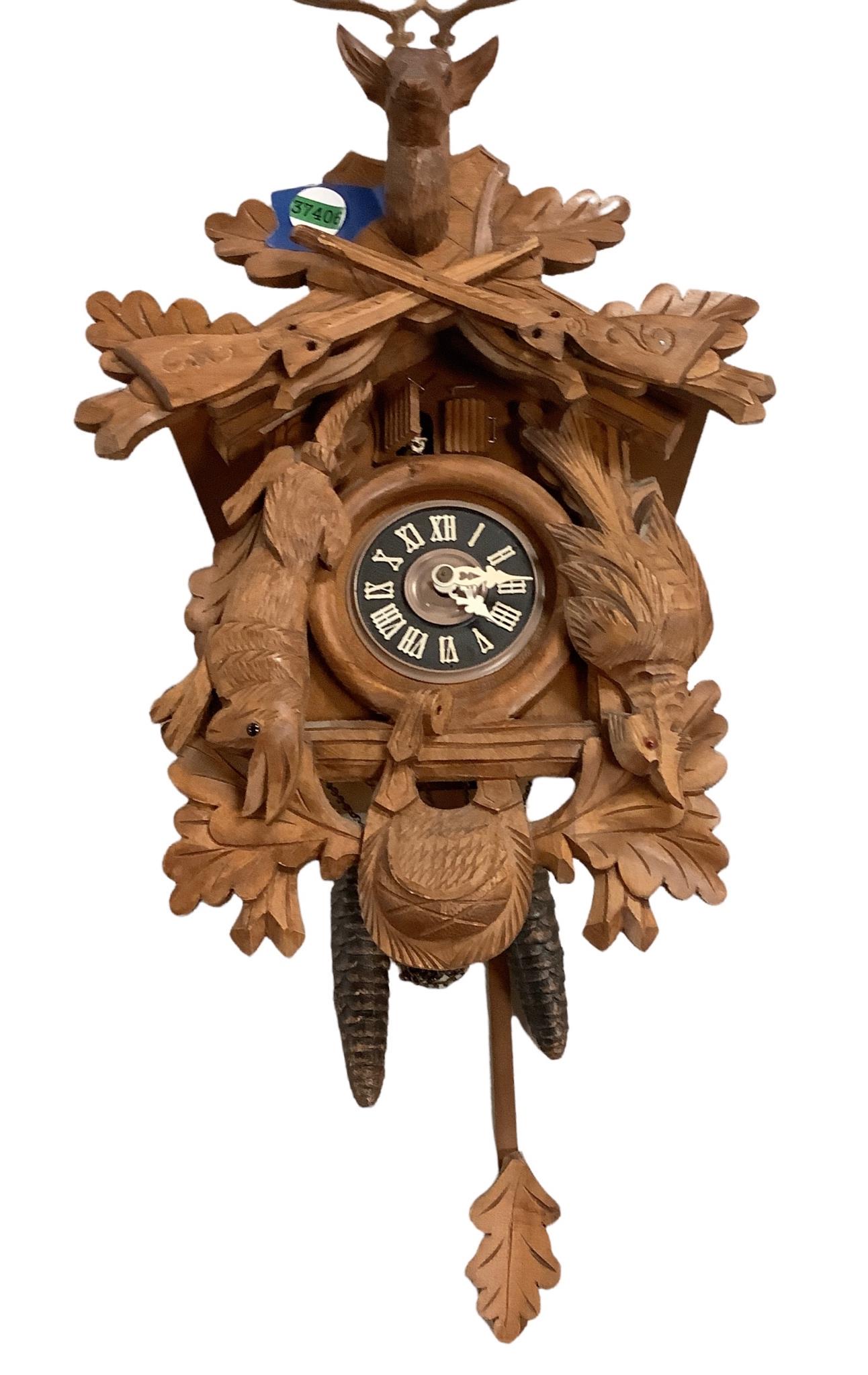 Wall cuckoo clock made in West Germany Not checked for working condition. (1 of 2)