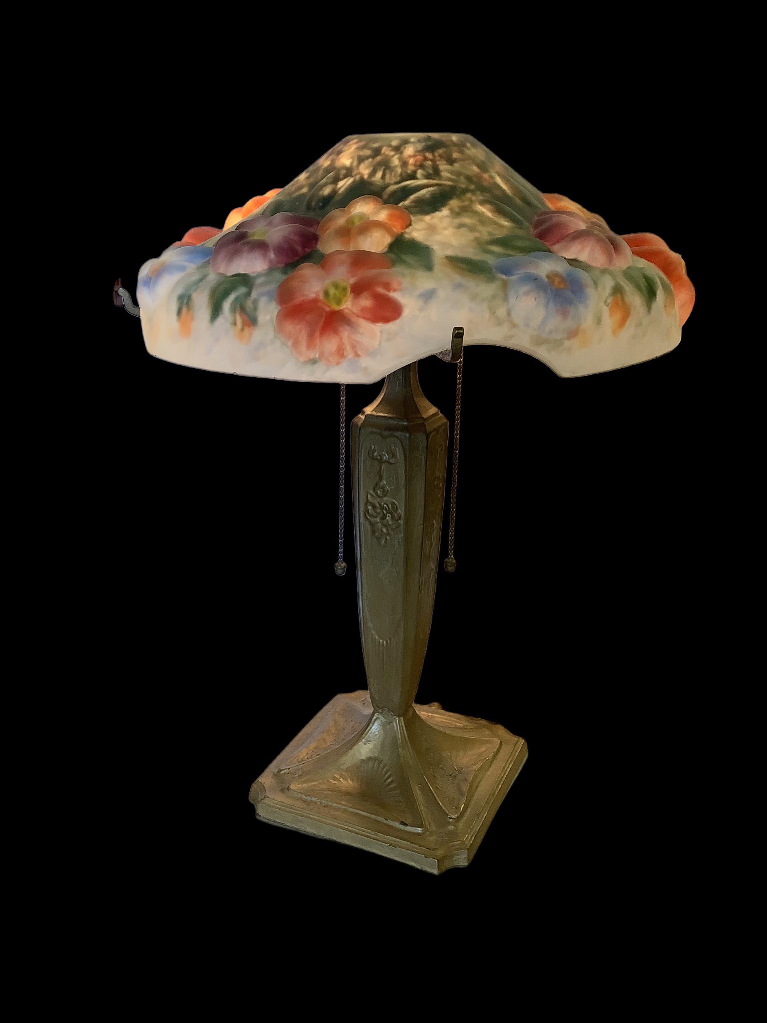 Pairpoint floral puffy glass lamp. The shade is reverse painted. The age of the shade is uncertain. (1 of 6)