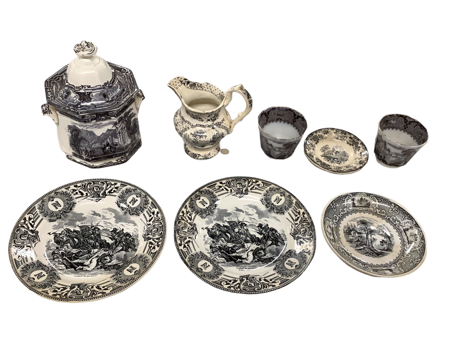 Lot of black & white dishes including 3 rose luster trimmed bowls. The plates measure from 8”: Lot of black & white dishes including 3 rose luster trimmed bowls. The plates measure from 8” to 4 1/2”. The table sugar stands 8” tall. The creamer is 6” tall to the top of th