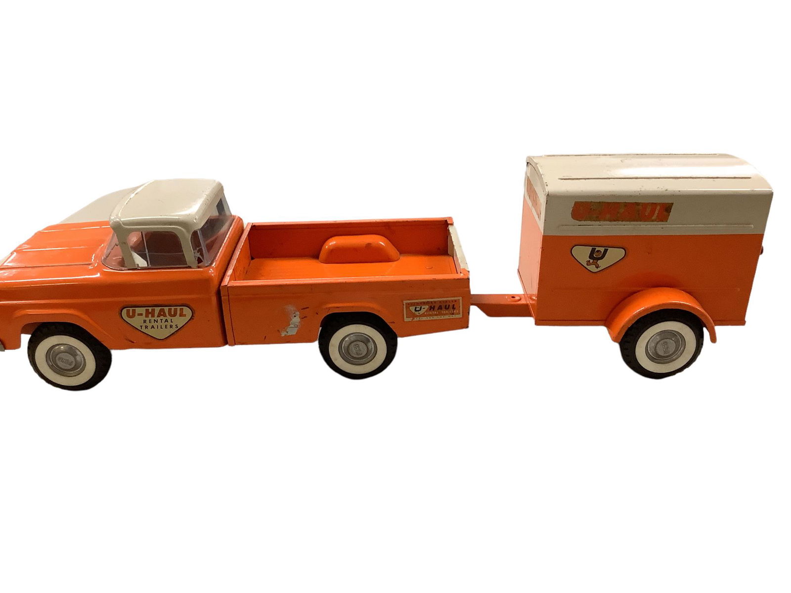 U-Haul toy truck and trailer. 21" long 5.5" high. Pressed steel by Nylint (1 of 1)