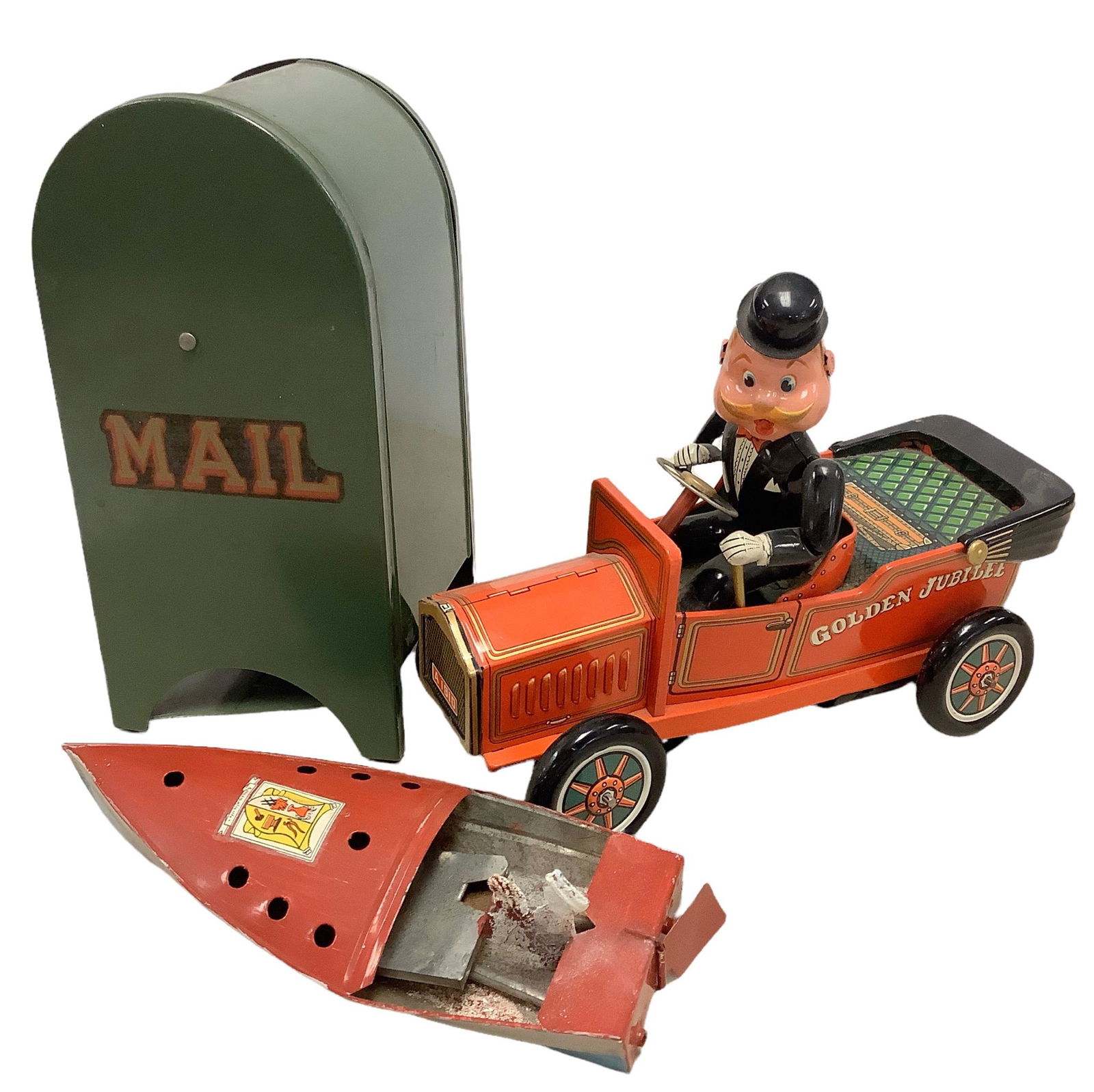 Lot of 3 tin toys, one a boat with removable sailor @ 8" long, a mailbox bank @ approx 10" tall and (1 of 2)