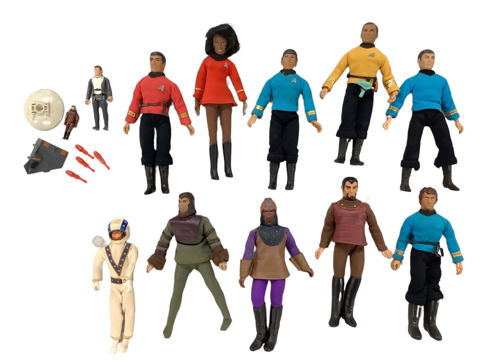 Lot of vintage action figures including Mego Star Trek figures and Planet of the Apes. There is a 7" (1 of 3)