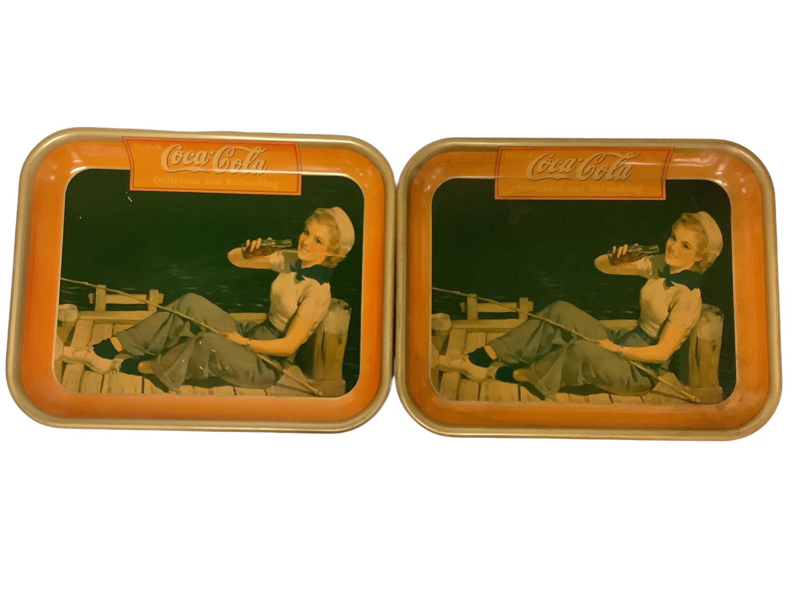 Lot of 2 American Artworks Coca Cola trays, Coshocton, OH, circa 1940, 10.5" x 13.25". Scratches in (1 of 2)