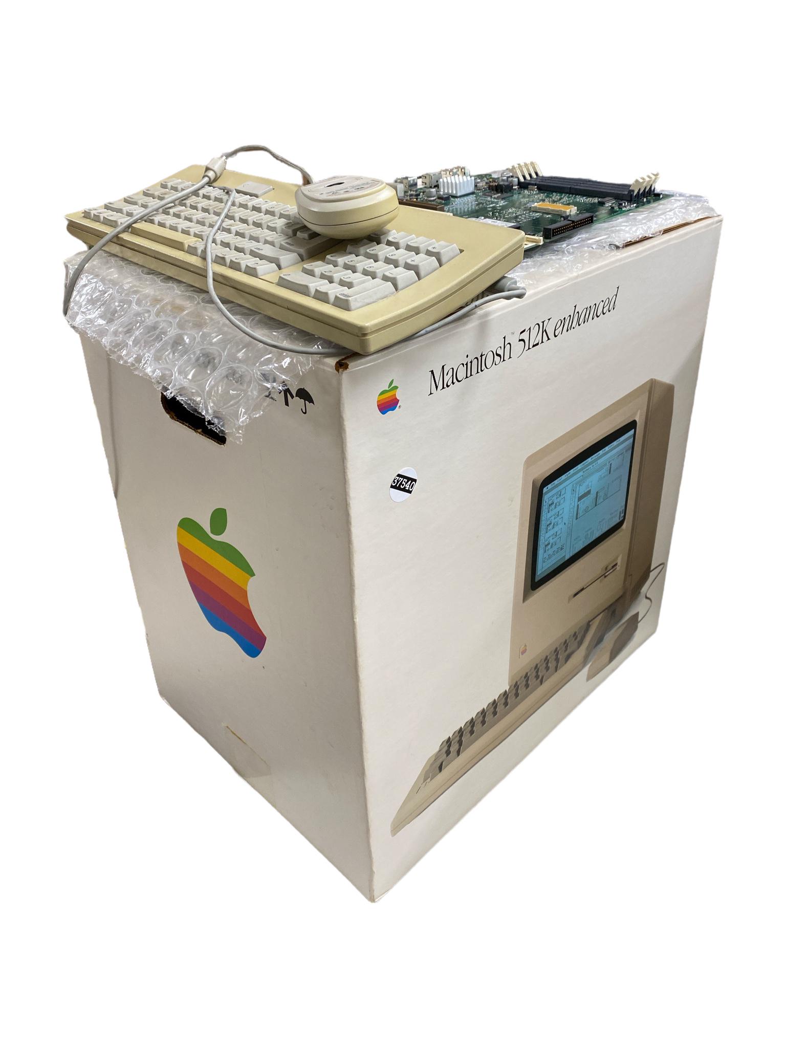 Macintosh 512K enhanced with keyboard, mouse, and computer board. Electronics are not tested or (1 of 2)