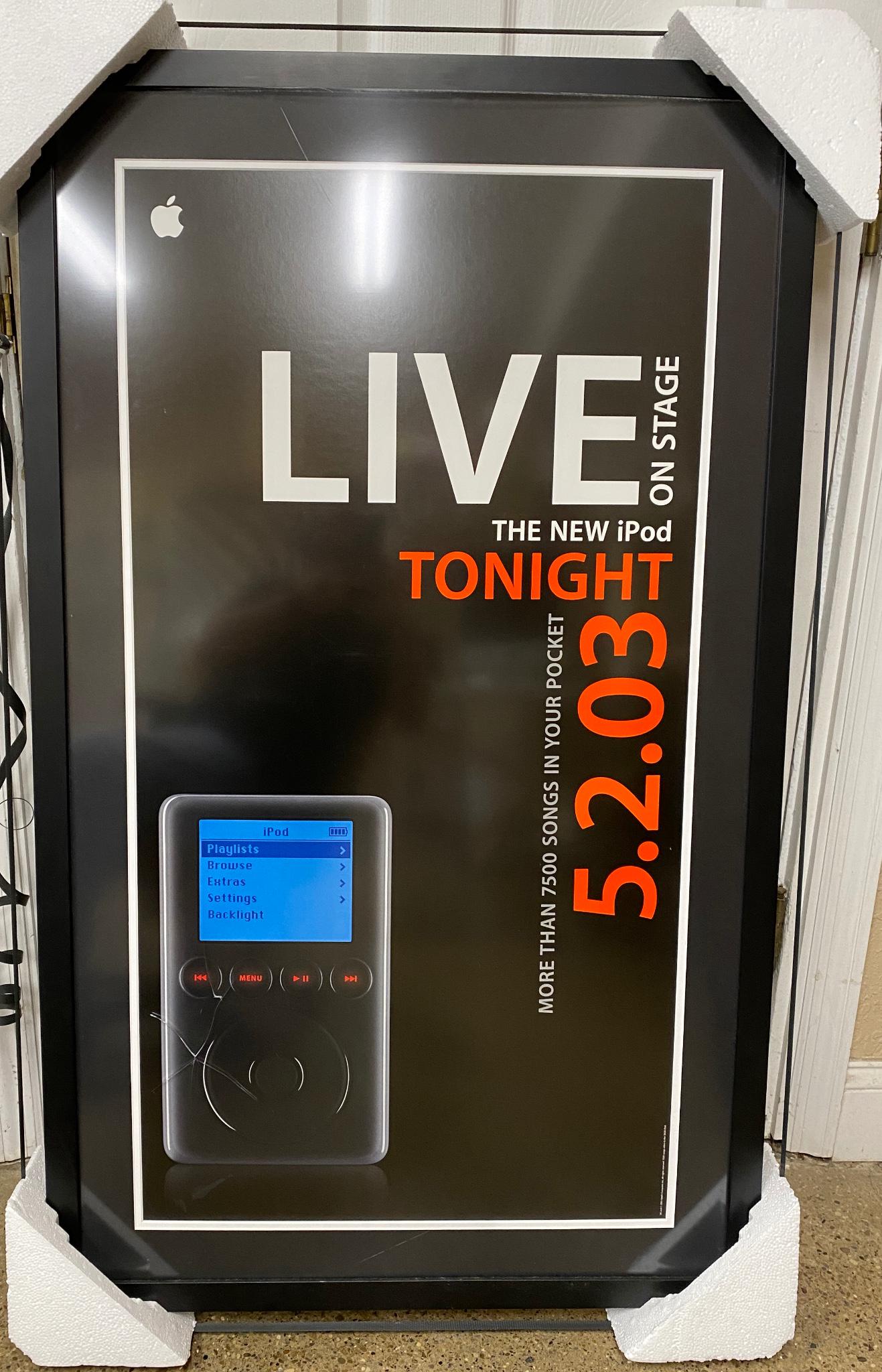 Macintosh THE NEW iPod poster, 27" x 45". Glass on frame has crack. (1 of 1)