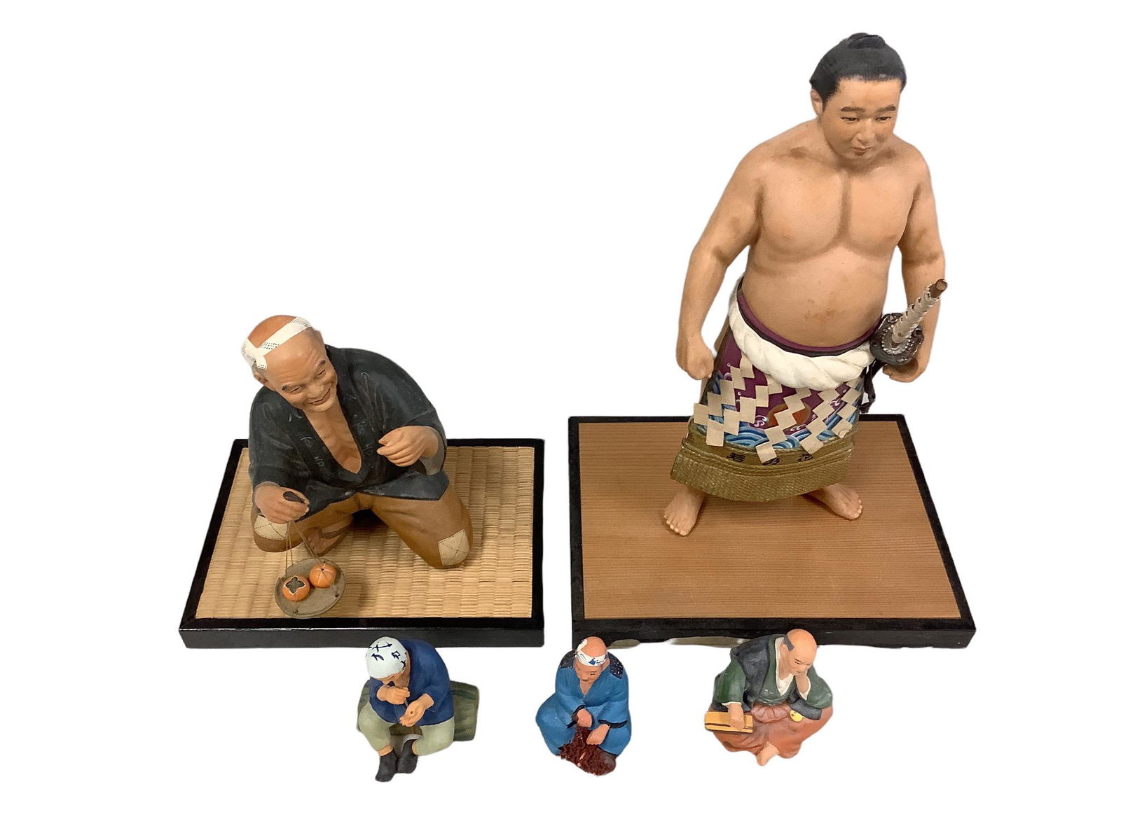 Lot of 5 Hakata dolls, ranging in height from 3.25 - 14", and 2 stands, one with peeling trim. (1 of 2)