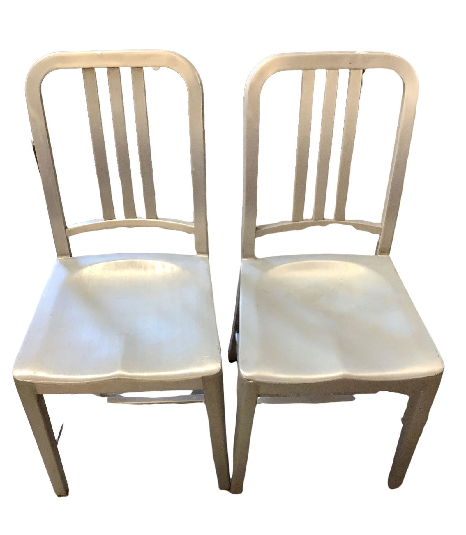 Pair Emeco aluminum chairs. Hand brushed all recycled aluminum metal chairs. 34" tall x 18" tall at (1 of 3)