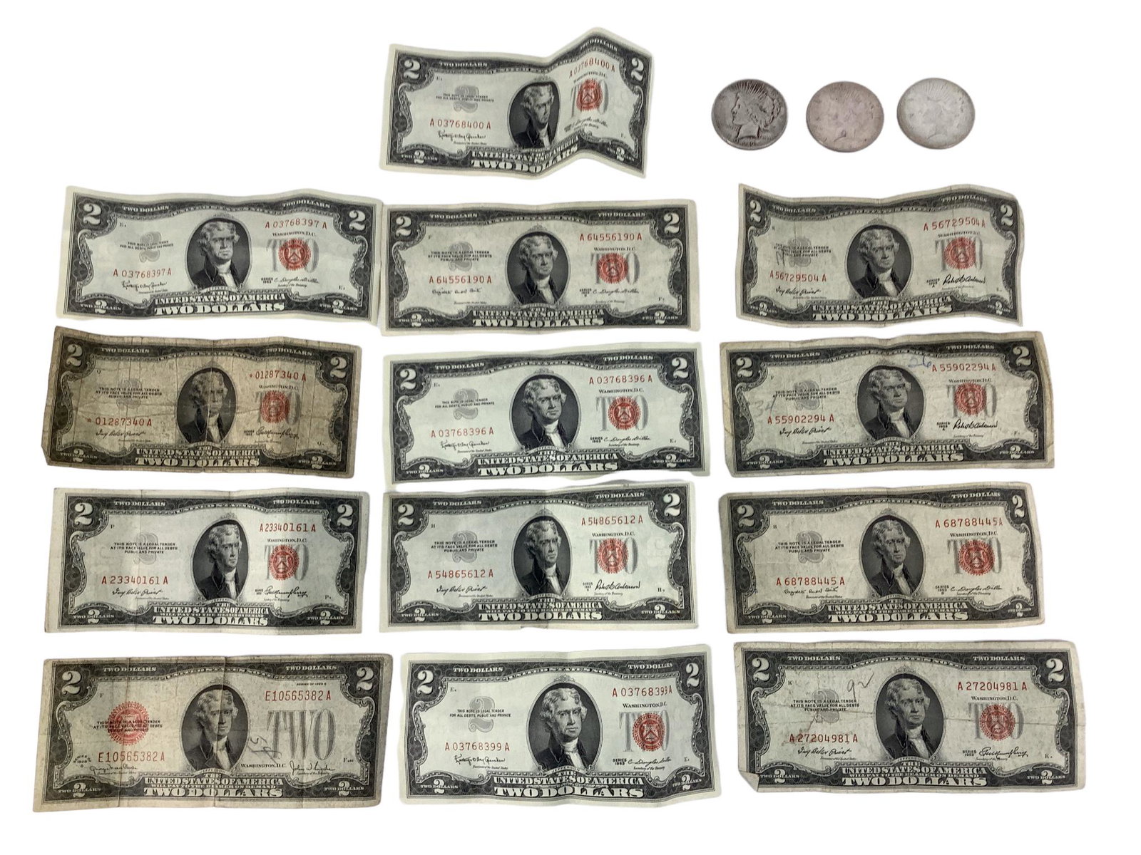 (3) Silver Peace Dollar Coins & (13) $2.00 Red Seal Notes & (1 of 4)