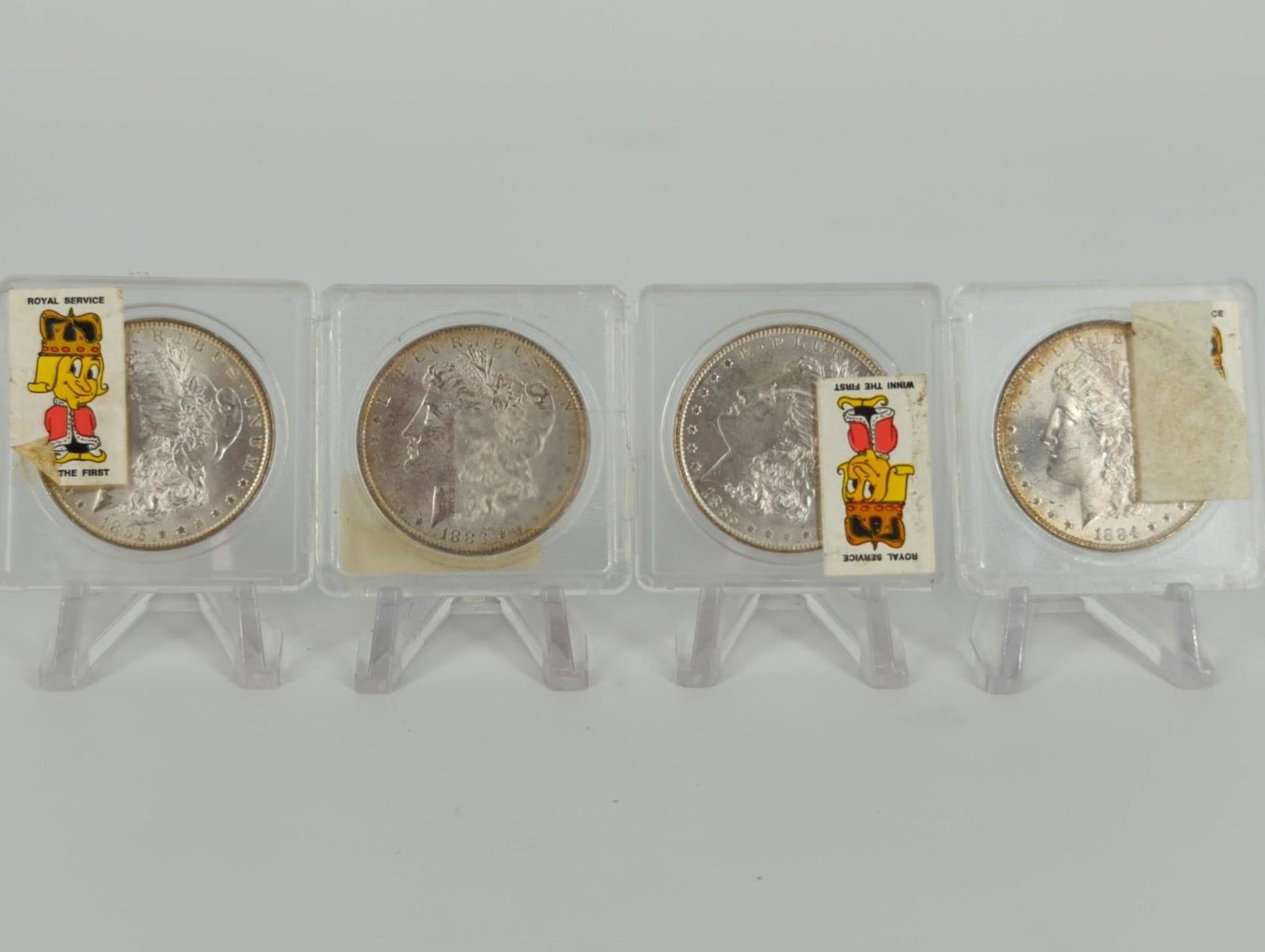 Four Morgan Silver Dollar Coins (1 of 10)