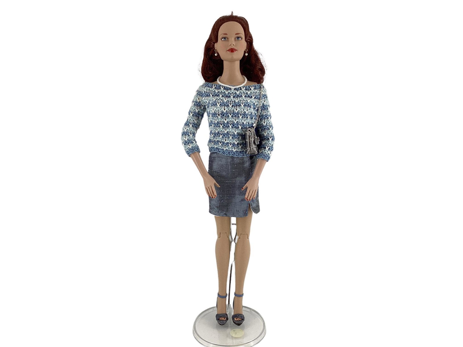 Robert Tonner Tyler Wentworth 16" Brenda Starr doll wearing "Jet set Jaunt" two-piece blue and white: Robert Tonner Tyler Wentworth 16" Brenda Starr doll wearing "Jet set Jaunt" two-piece blue and white sweater, blue taffeta skirt, gray and blue faux leather purse, sheer hose, blue high heel shoes and