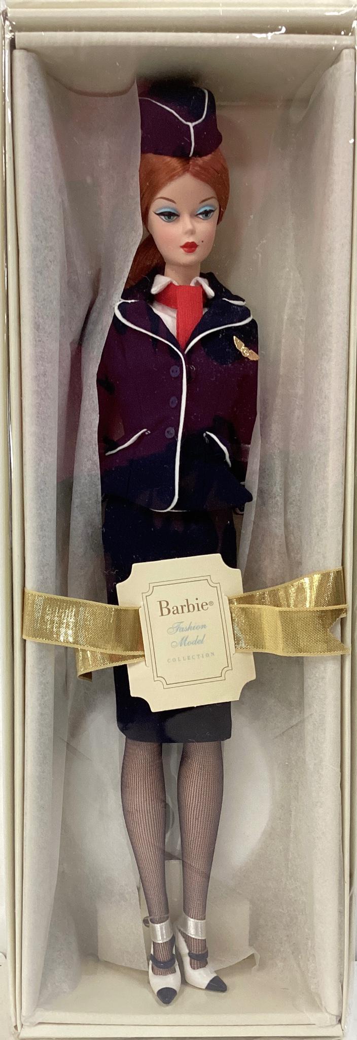 (1) Very HTF The Stewardess of the Barbie Fashion Model Collection. Genuine Silkstone Body and Gold: (1) Very HTF The Stewardess of the Barbie Fashion Model Collection. Genuine Silkstone Body and Gold Label. NRFB, she was sealed so she could be displayed without removing her from her box. This mint p