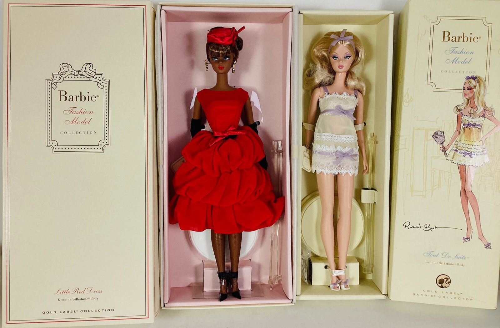 (2) BFMC Barbies including (1) Little Red Dress Silkstone AA Barbie wearing a gorgeous lipstick red: (2) BFMC Barbies including (1) Little Red Dress Silkstone AA Barbie wearing a gorgeous lipstick red cocktail dress. Barbie is a Gorgeous Gold Label Barbie, with no more than 9,100 worldwide. NRFB - MI