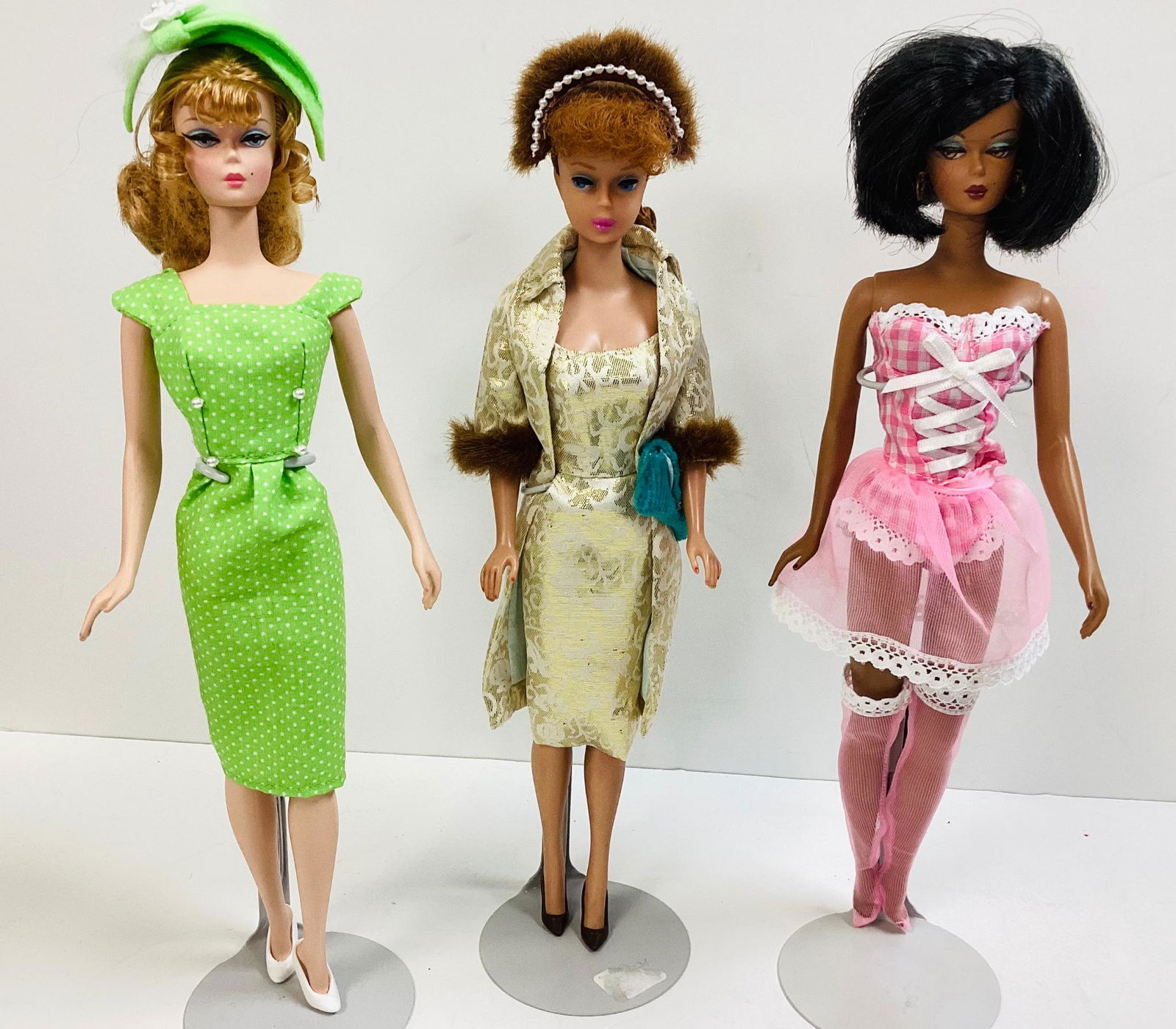 (3) Barbies including a (1) beautiful Silkstone Barbie from the BFMC w/ blond hair, OOAK dress,: (3) Barbies including a (1) beautiful Silkstone Barbie from the BFMC w/ blond hair, OOAK dress, pretty OOAK hat and white flats (1) Vintage red haired Ponytail Barbie with ponytail redone and Barbie i