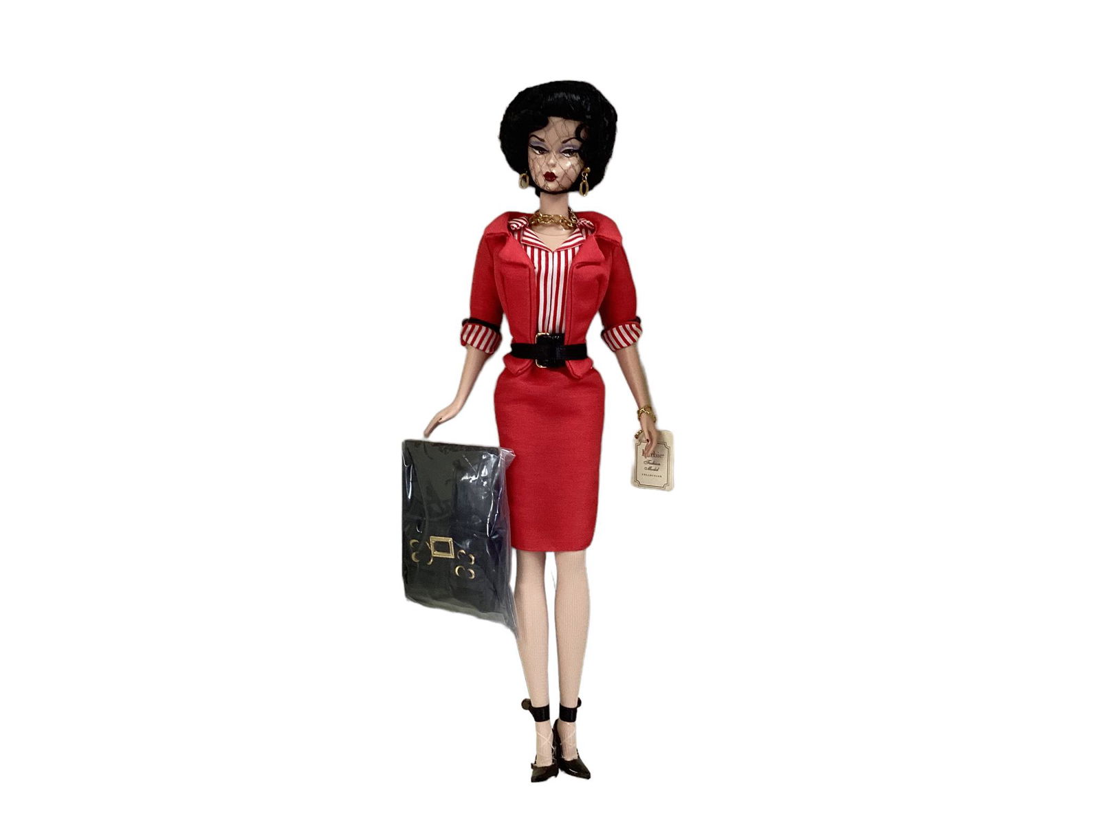 (1) BFMC Gal On The Go Barbie w/ silkstone body. Gal on the Go Barbie pays homage to Busy Gal but: (1) BFMC Gal On The Go Barbie w/ silkstone body. Gal on the Go Barbie pays homage to Busy Gal but have been reinvented for this era. Red pencil skirt & jacket w/striped blouse & other accessories. NRF