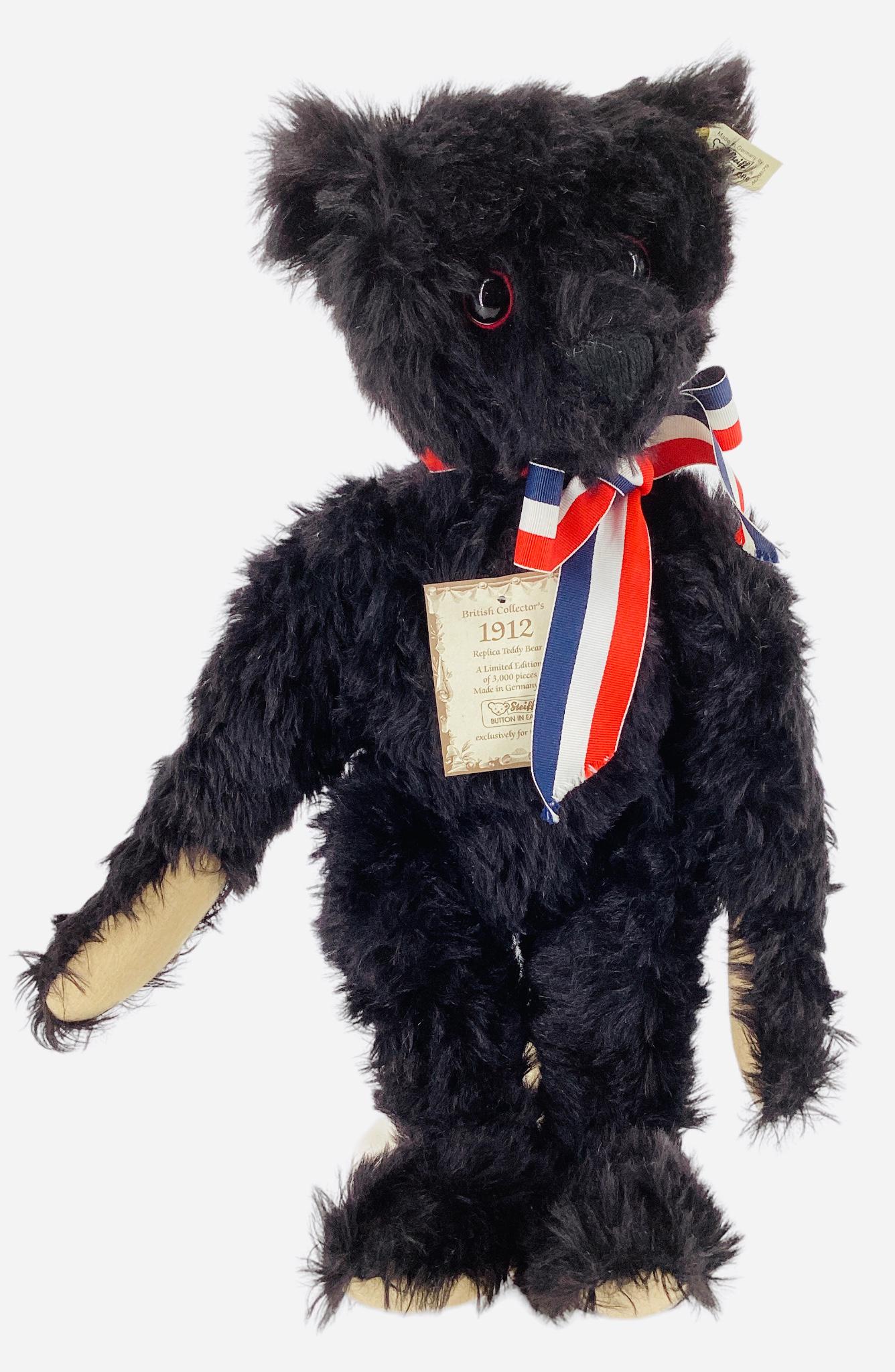 Steiff British Collector's 1912 Replica Black Teddy Bear, jointed head, arms and legs. Padded paws (1 of 2)