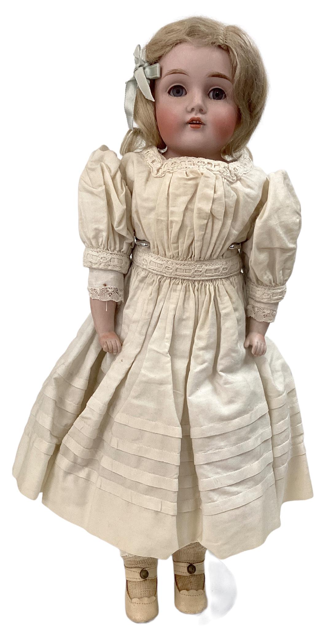 Kestner 154 bisque shoulder head girl. 16 1/2" doll with original mohair wig on plaster pate, glass: Kestner 154 bisque shoulder head girl. 16 1/2" doll with original mohair wig on plaster pate, glass sleep eyes, open mouth with teeth, on rivet jointed kid body with bisque lower arms. Nicely costumed