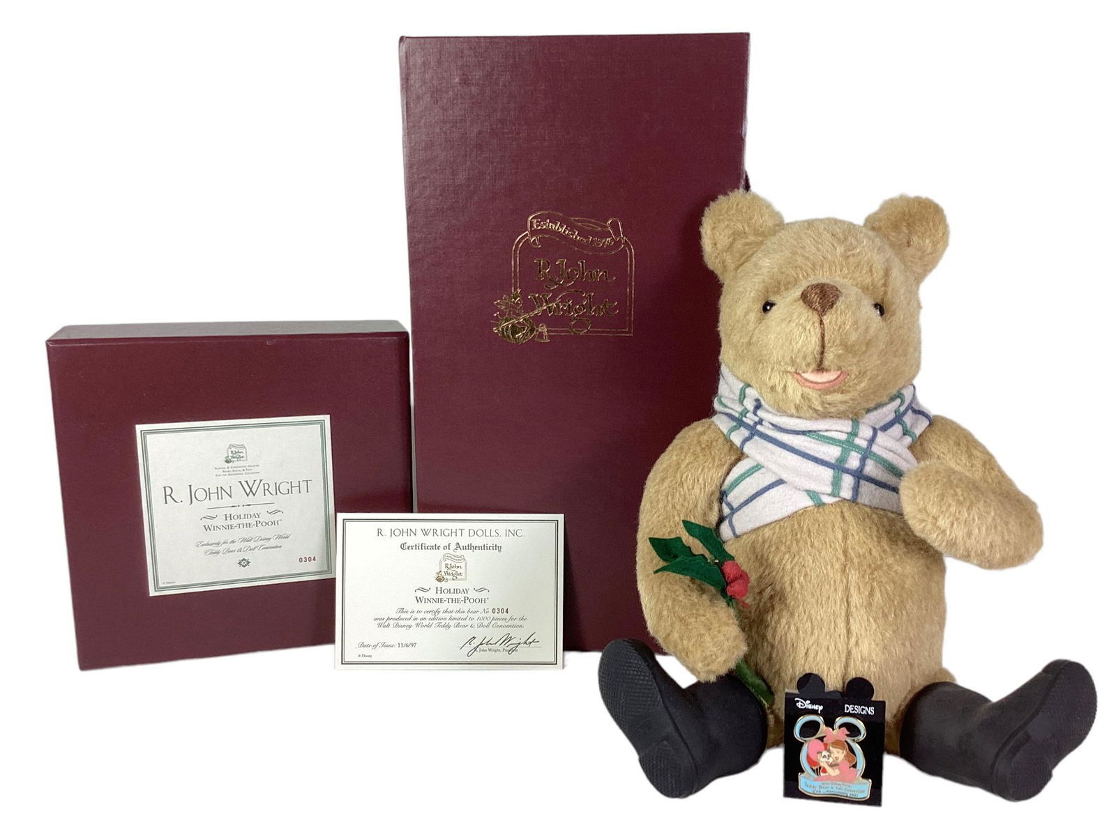 R. John Wright Dolls, "Holiday" Winnie-The-Pooh, No.0304/1000. With COA and original box. Teddy Bear: R. John Wright Dolls, "Holiday" Winnie-The-Pooh, No.0304/1000. With COA and original box. Teddy Bear & Doll Convention Pin included.