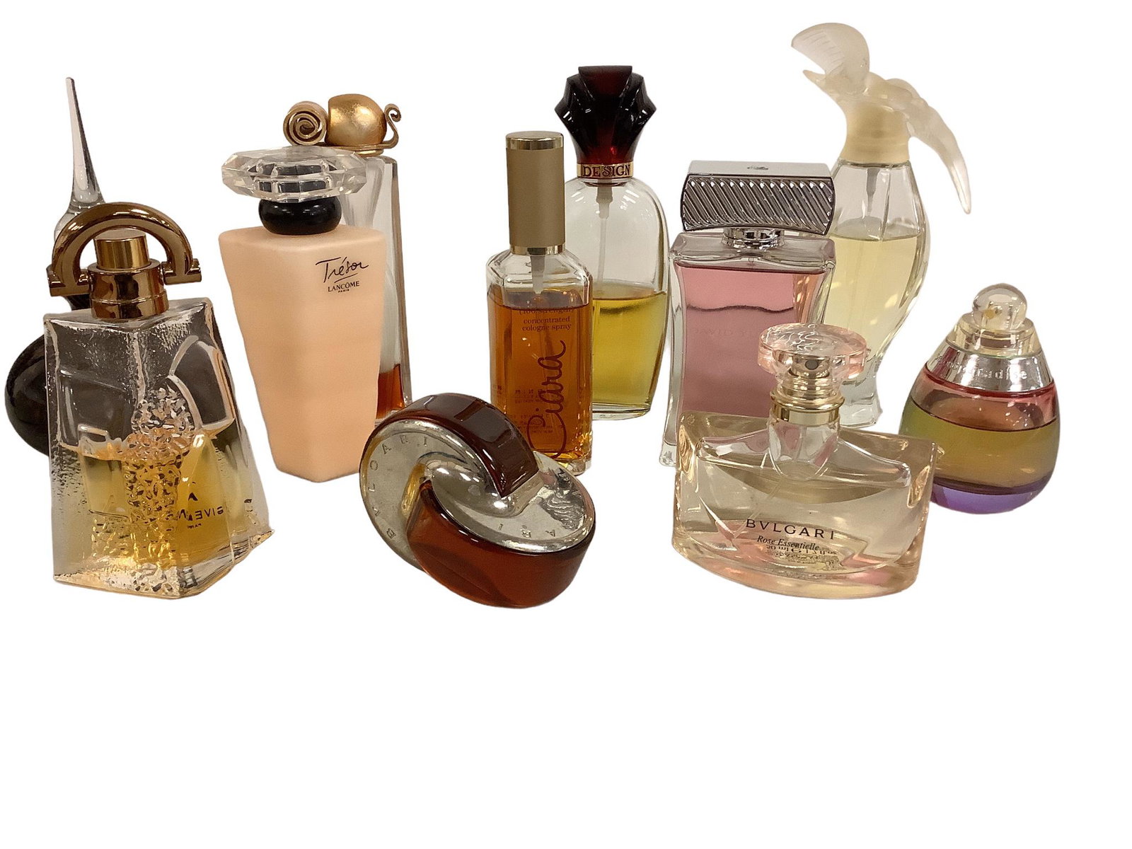 Lot of 11 perfume bottles including Givenchy, Bvlgari, and EstÃ©e Lauder. There is also a glass: Lot of 11 perfume bottles including Givenchy, Bvlgari, and EstÃ©e Lauder. There is also a glass perfume decanter.