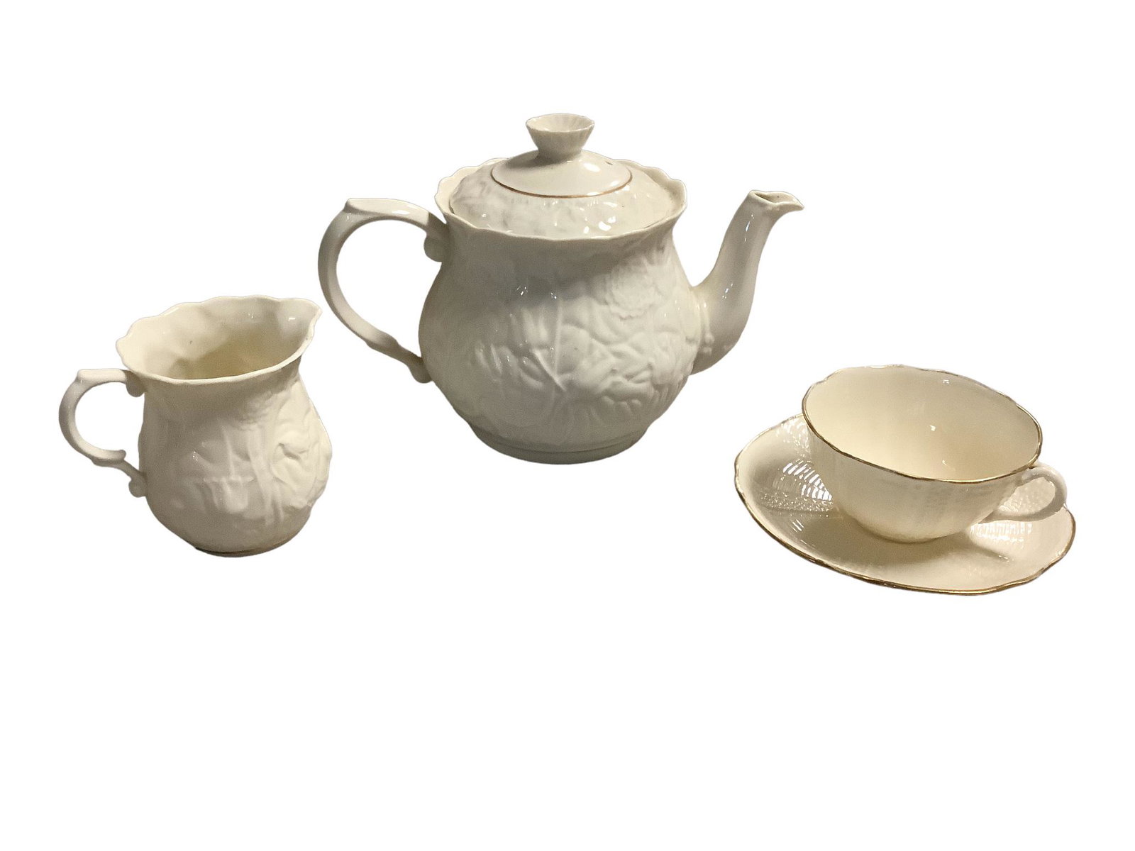Belleek Serenity tea pot and creamer and sea urchin cup and saucer (black mark).: Belleek Serenity tea pot and creamer and sea urchin cup and saucer (black mark).