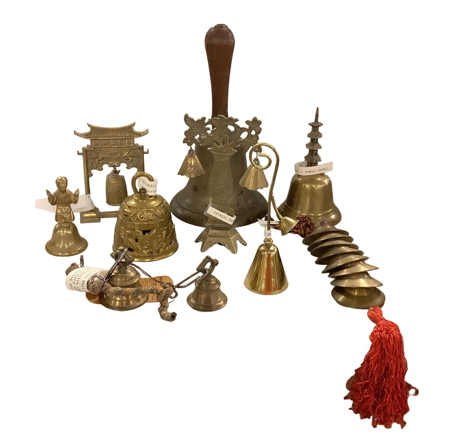 Lot of 10 bells. Tasseled String of eight cymbals from India. Heavy brass 10 inch school bell with (1 of 4)