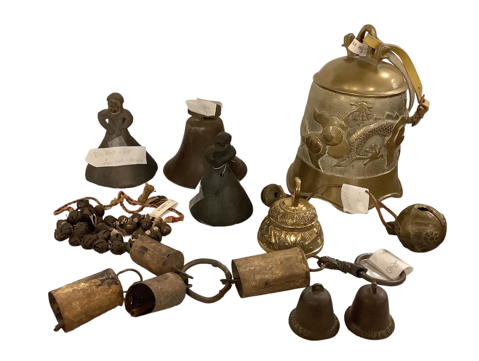 Lot of 10 assorted bells. Large antique brass Chinese bell with no clapper- 8 inches tall. Two lava (1 of 5)