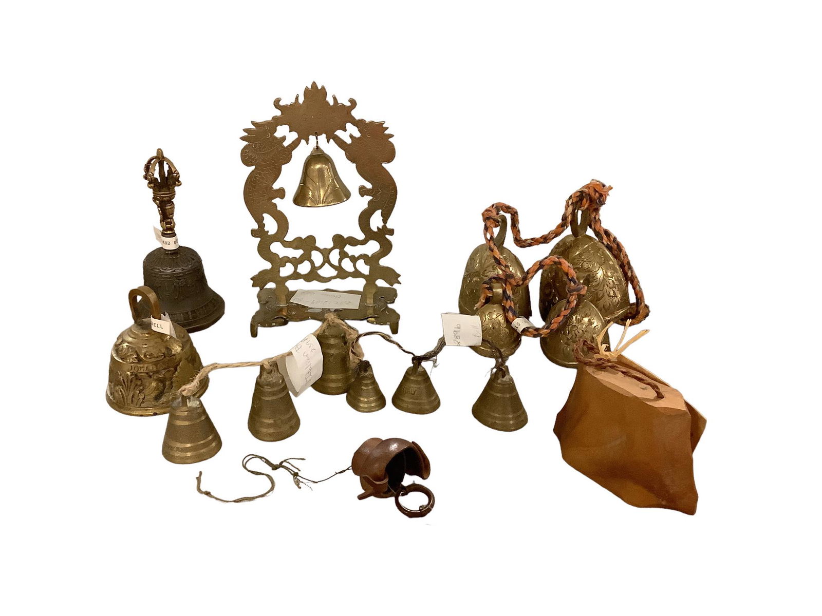 Lot of 8 bells. Three strands of brass bells. Two small strands from Italy and an ornate strand from (1 of 5)