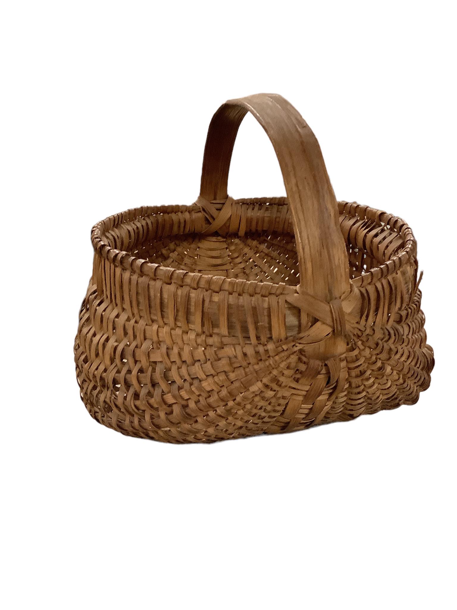 Vintage woven splint buttocks / egg basket measuring 9" top diameter x 9 tall including handle. (1 of 2)