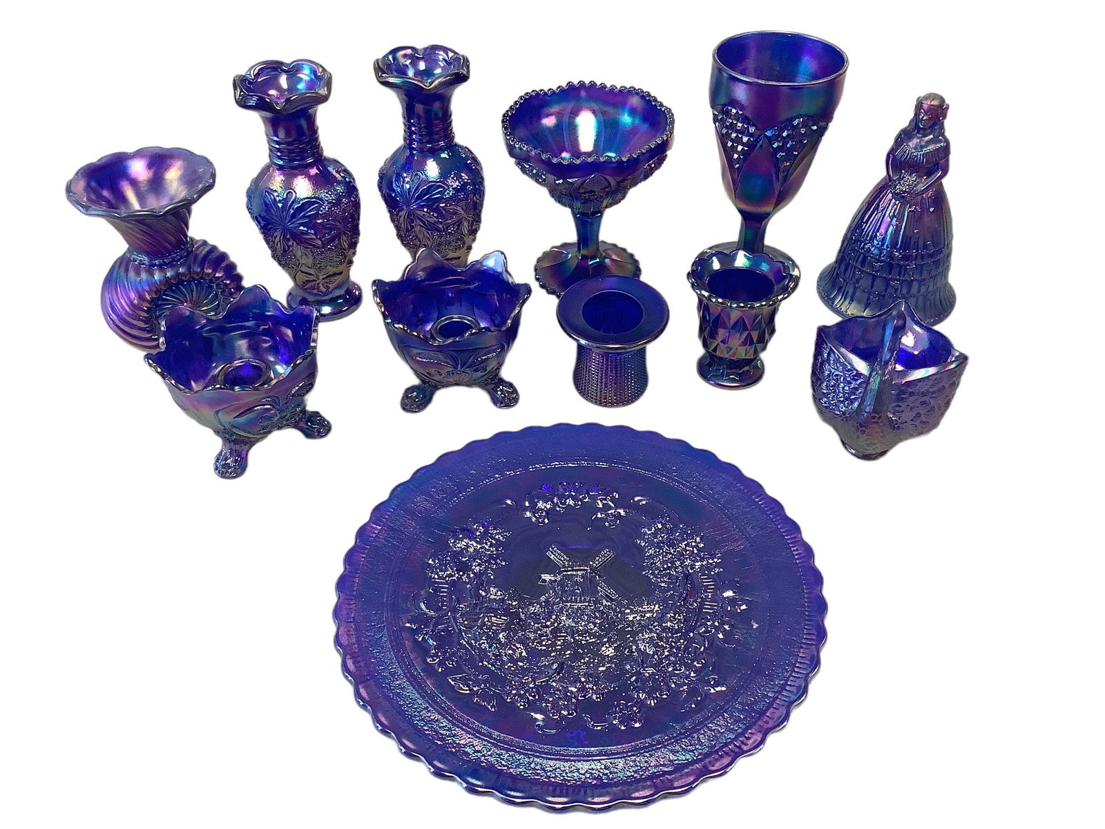 Lot of 12 pieces of Imperial cobalt carnival glass vases, candle holders, a bell, a goblet, a (1 of 1)
