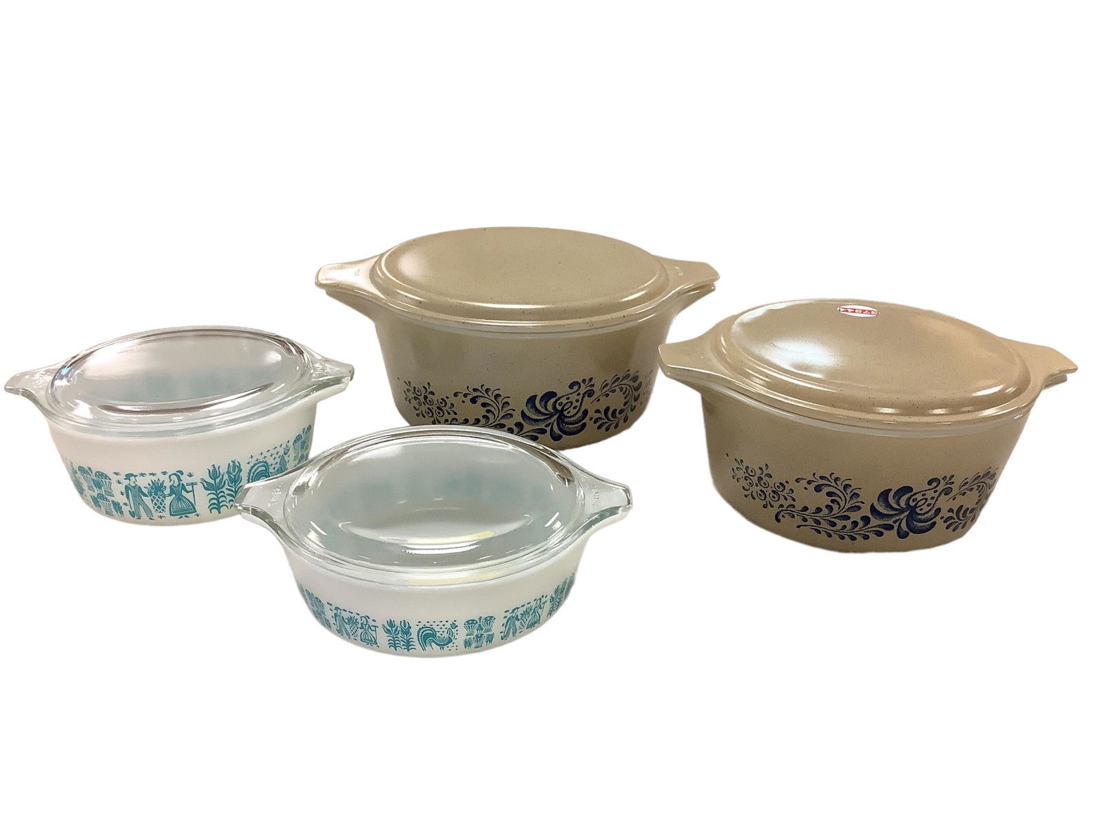 Lot of 4 vintage Pyrex casserole dishes including a one pint and a pint and a half pint in the (1 of 1)