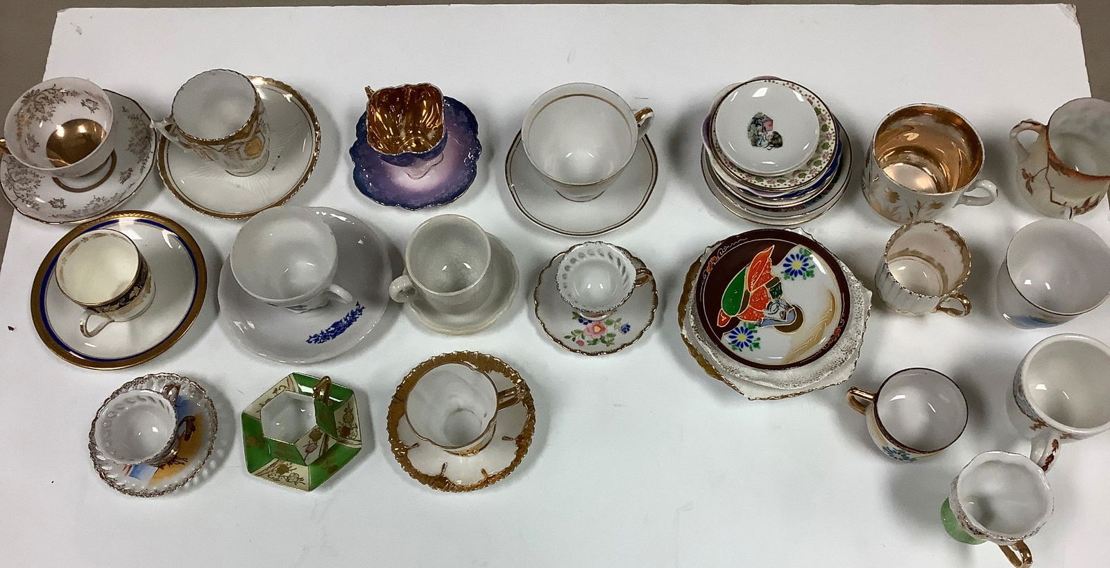 Vintage small cups and saucer sets and some extra that don't have matches. (1 of 1)
