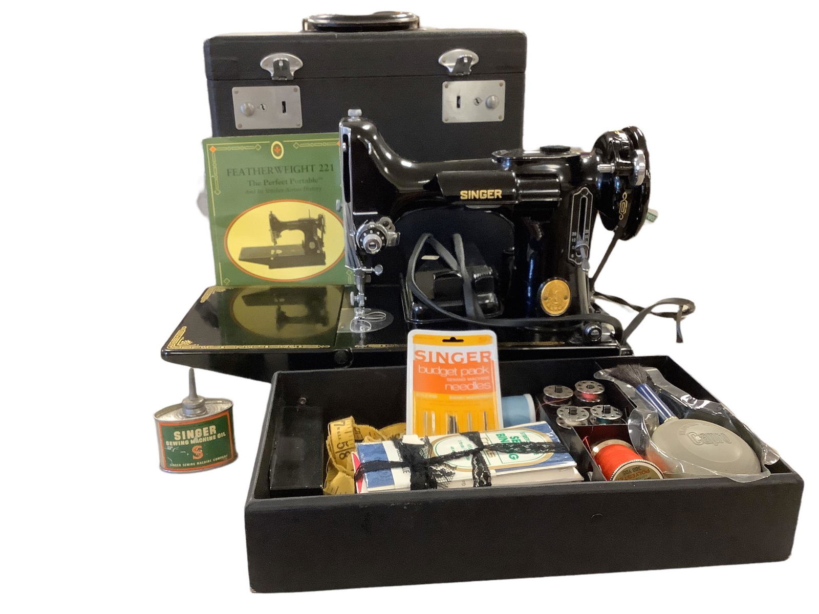 Vintage Singer Featherweight 221 sewing machine with book and accessories. (1 of 2)