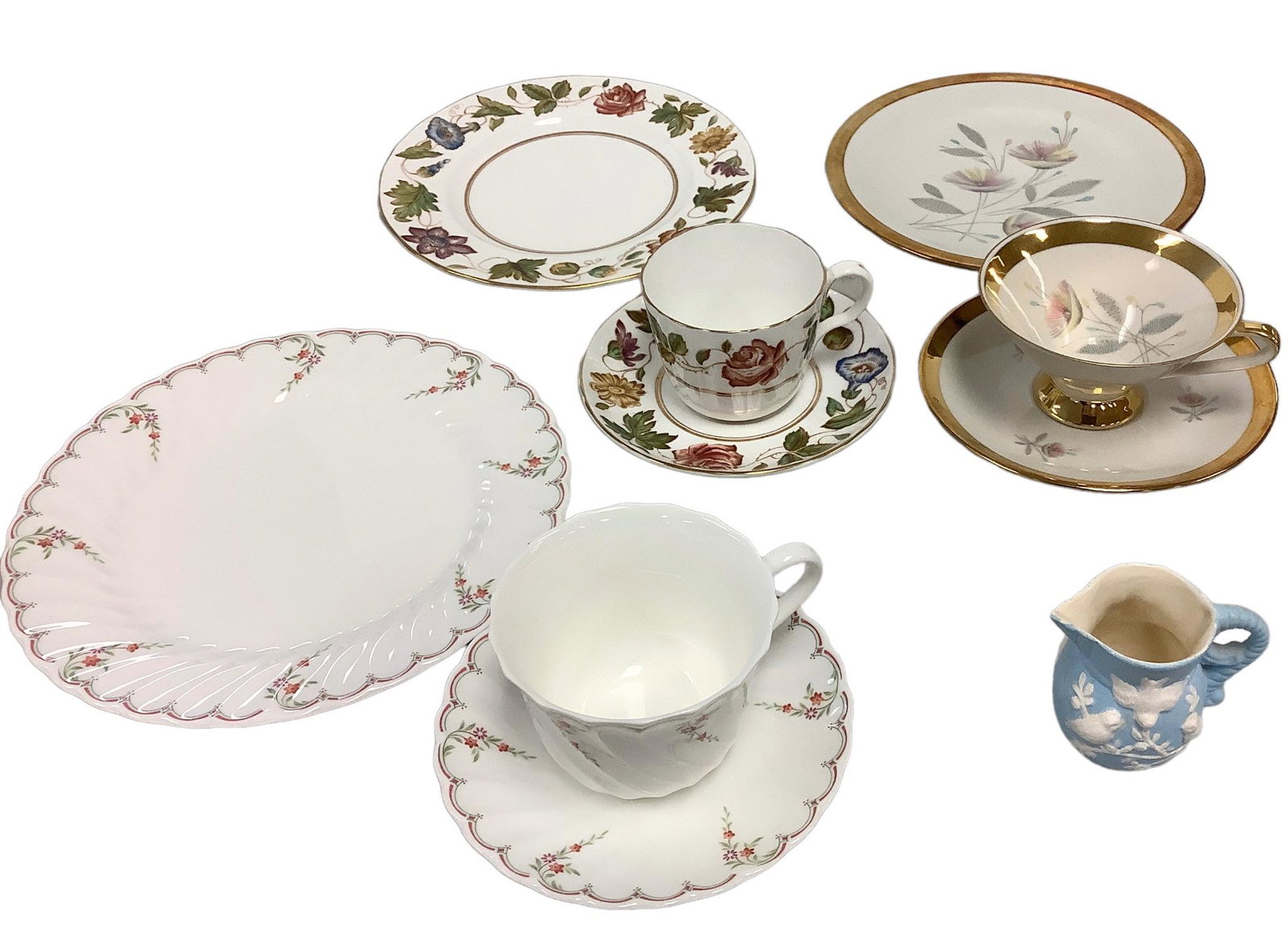 Lot of 10. Three 3-piece snack sets and miniature creamer. Wedgwood bone china "Pink Garland" 8.5": Lot of 10. Three 3-piece snack sets and miniature creamer. Wedgwood bone china "Pink Garland" 8.5" plate, 5.5" saucer and teacup. Royal Worcester "Virginia" 8" plate, 5.5" saucer and teacup. Bavaria E