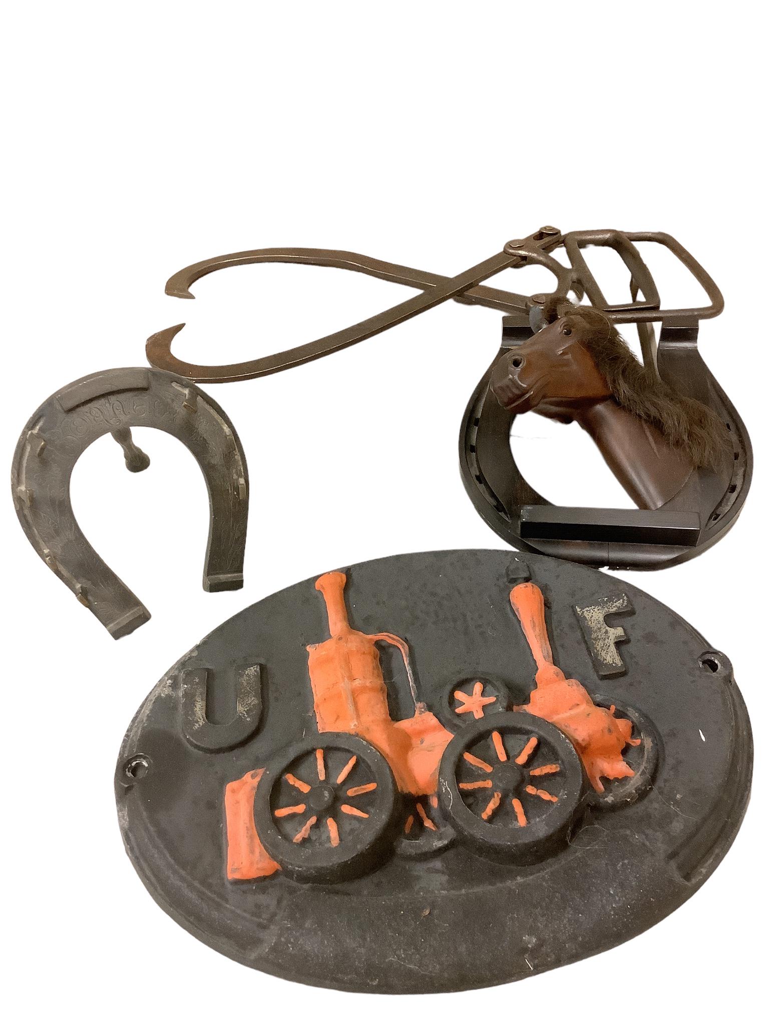 Lot of 4 items includes an engraved metal horseshoe decorative item, a metal painted plaque with (1 of 2)