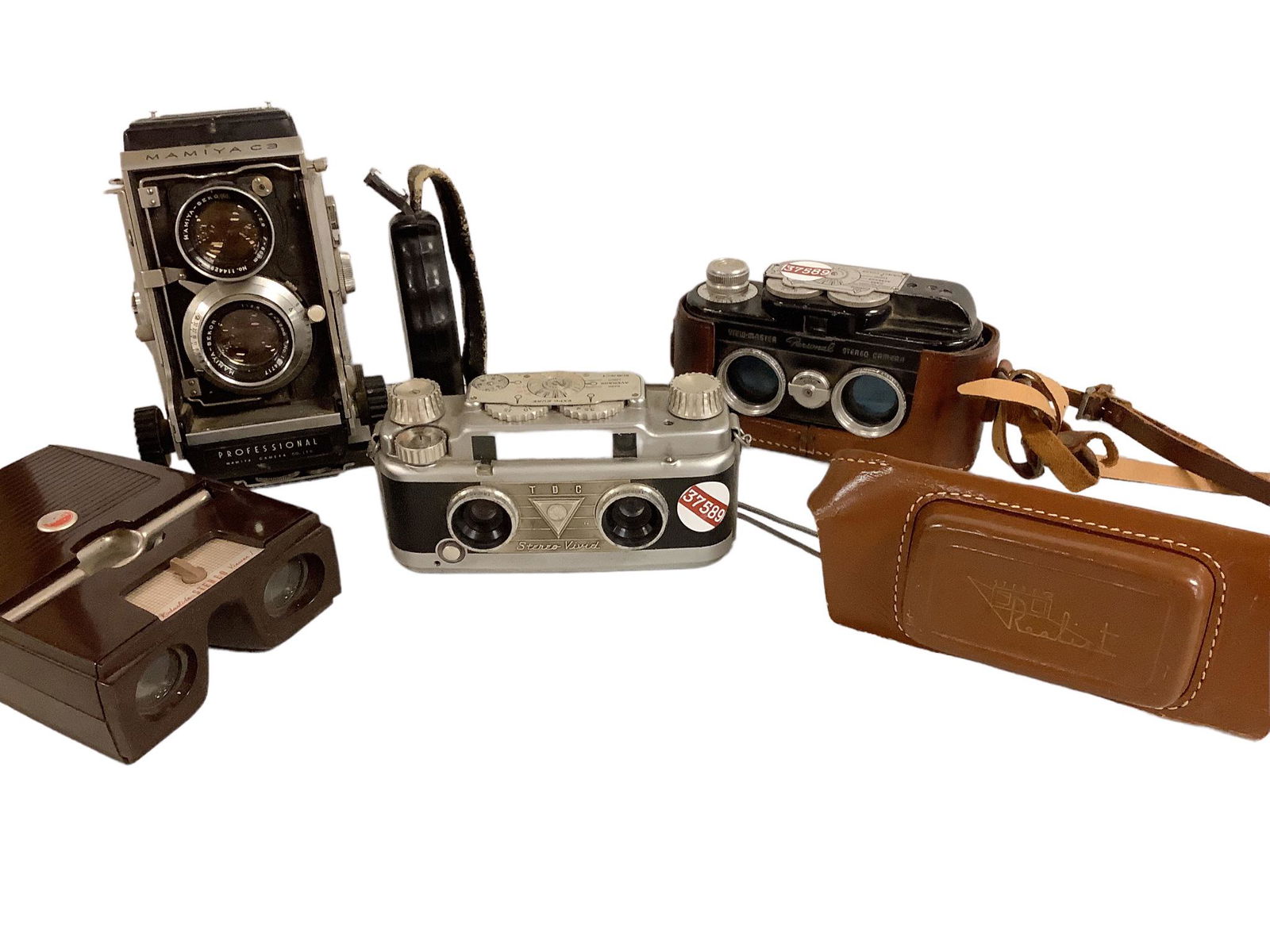 Lot of 4 vintage camera and stereo-viewing items, several have leather cases. (1 of 2)